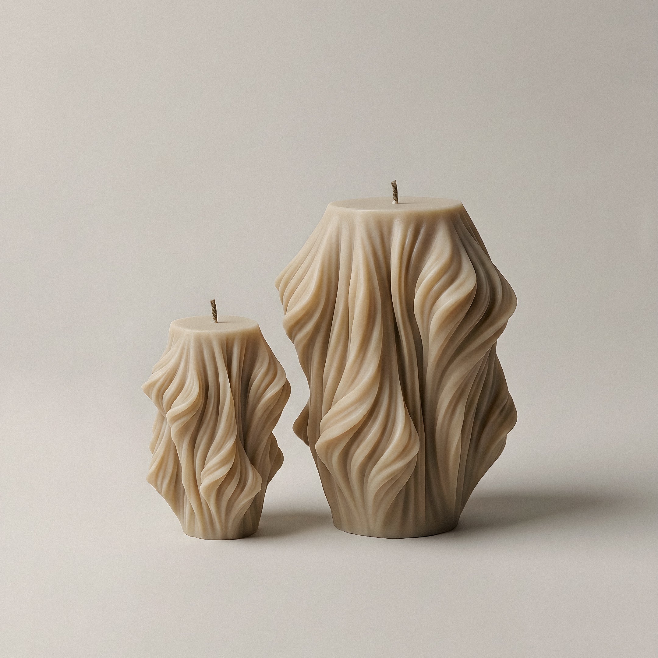 Close-up detail of handmade sculptural candle showing cascading wave texture in premium soy wax from Los Angeles