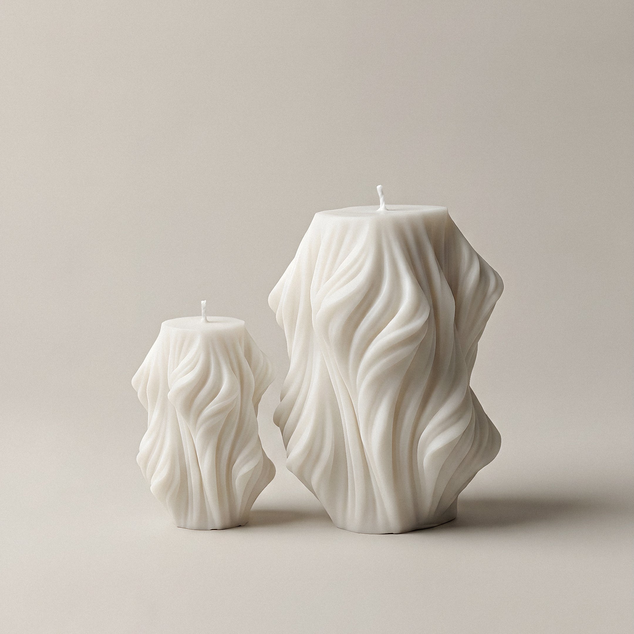 Close-up detail of handmade Cascading Wave sculptural candle showing flowing layers of premium soy wax texture