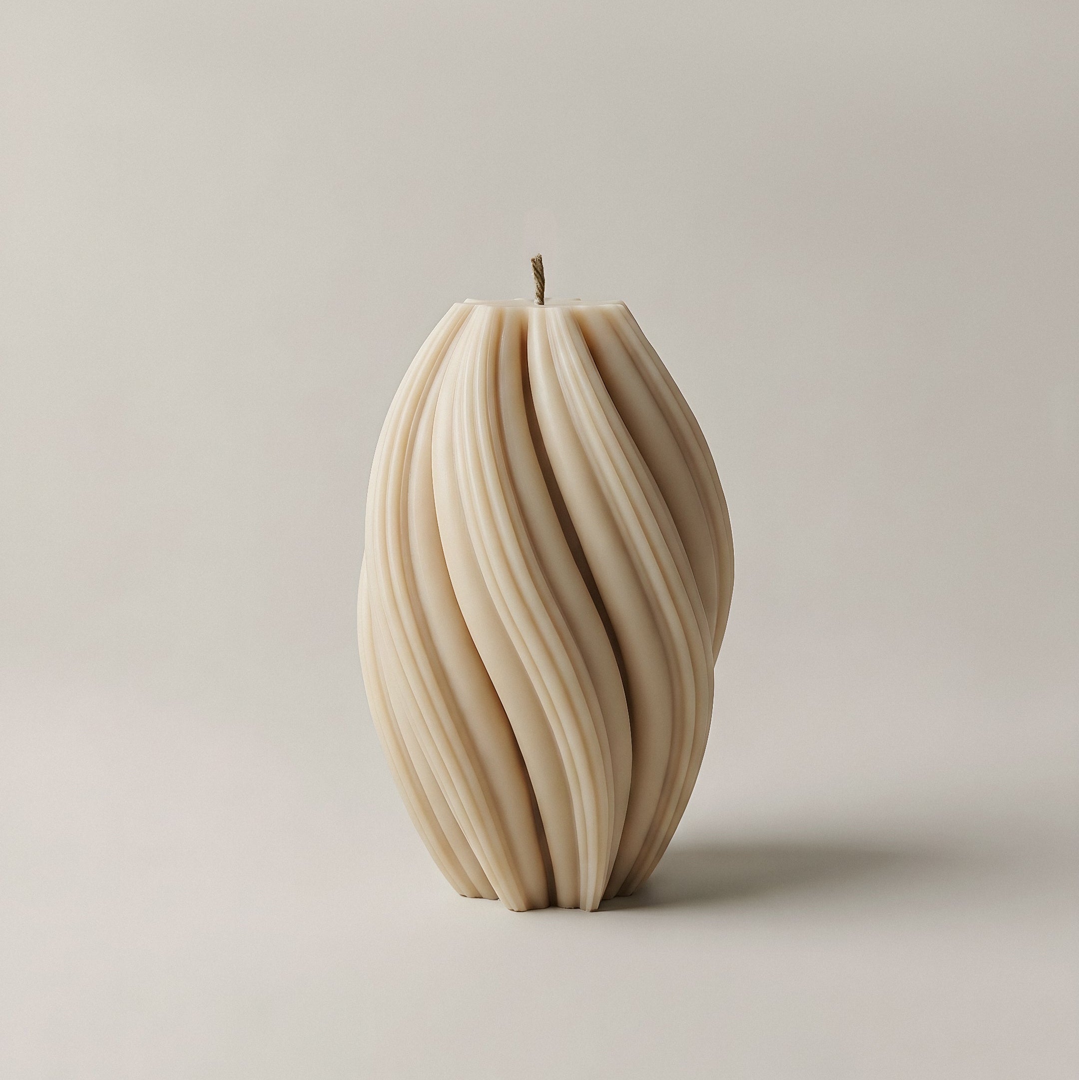 Handmade sculptural swirl candle detail showing premium soy wax texture in natural light Los Angeles studio