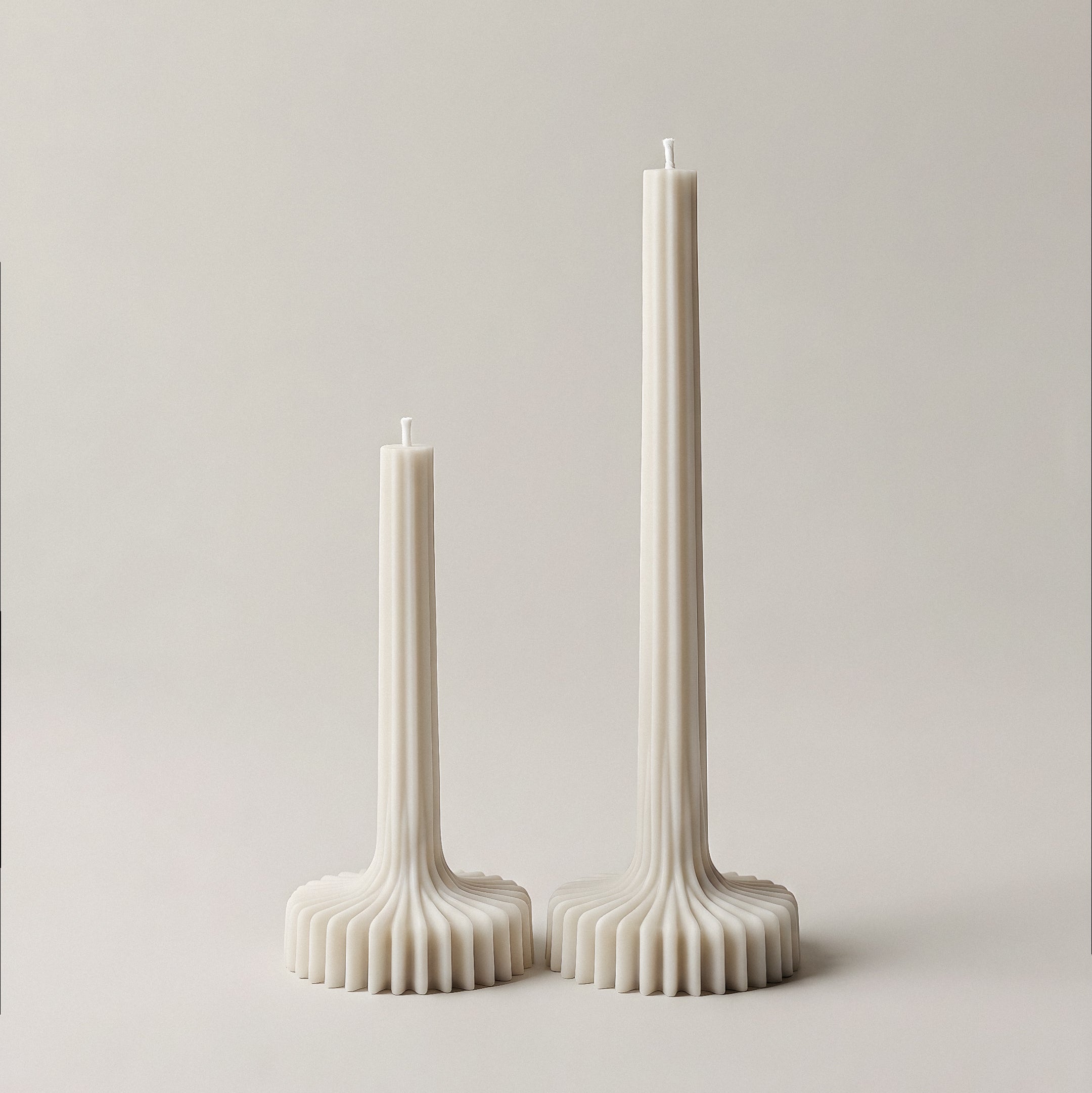 Close-up detail of handmade sculptural vase candle showing premium soy wax texture and cotton wick