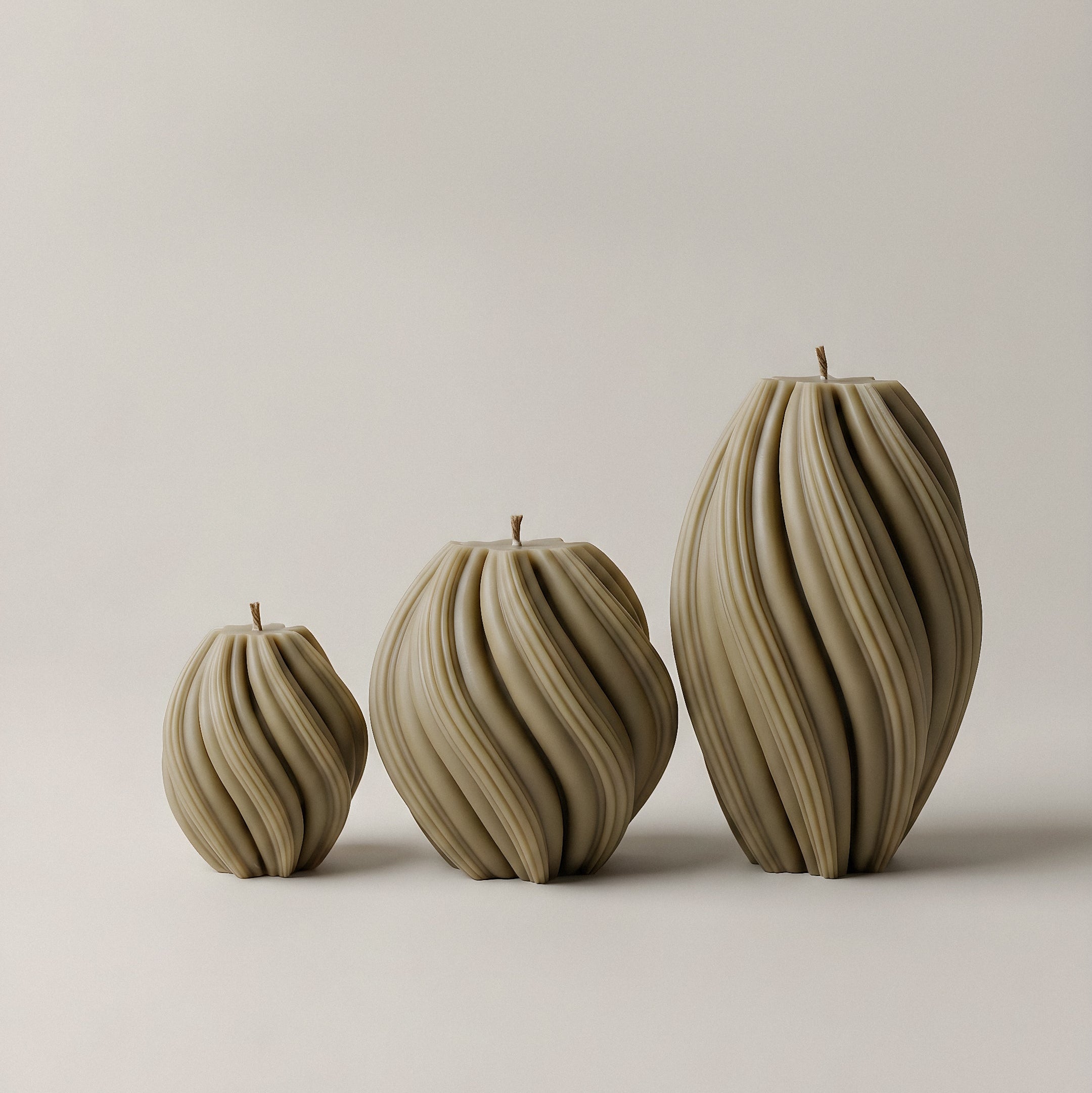 Close-up detail of handmade Swirl Candle showing textured soy wax surface and sculptural spiral design