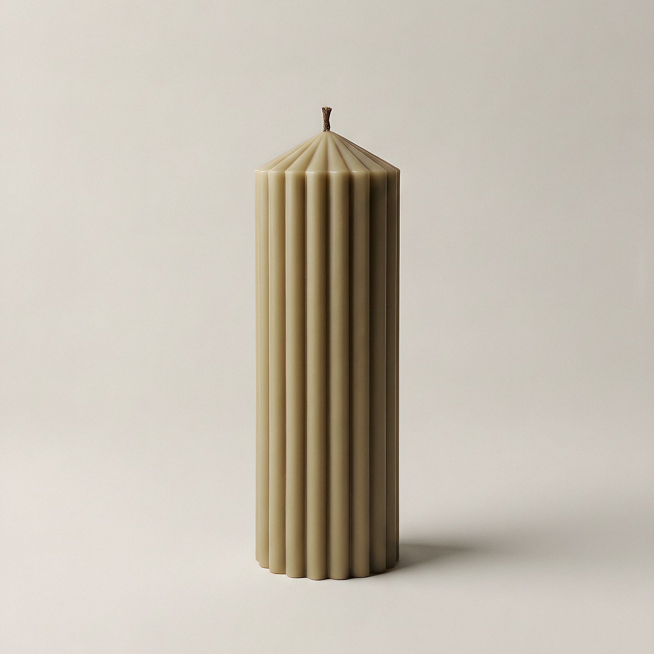 Close-up detail of handmade Peak sculptural candle showing premium soy wax texture and natural cotton wick
