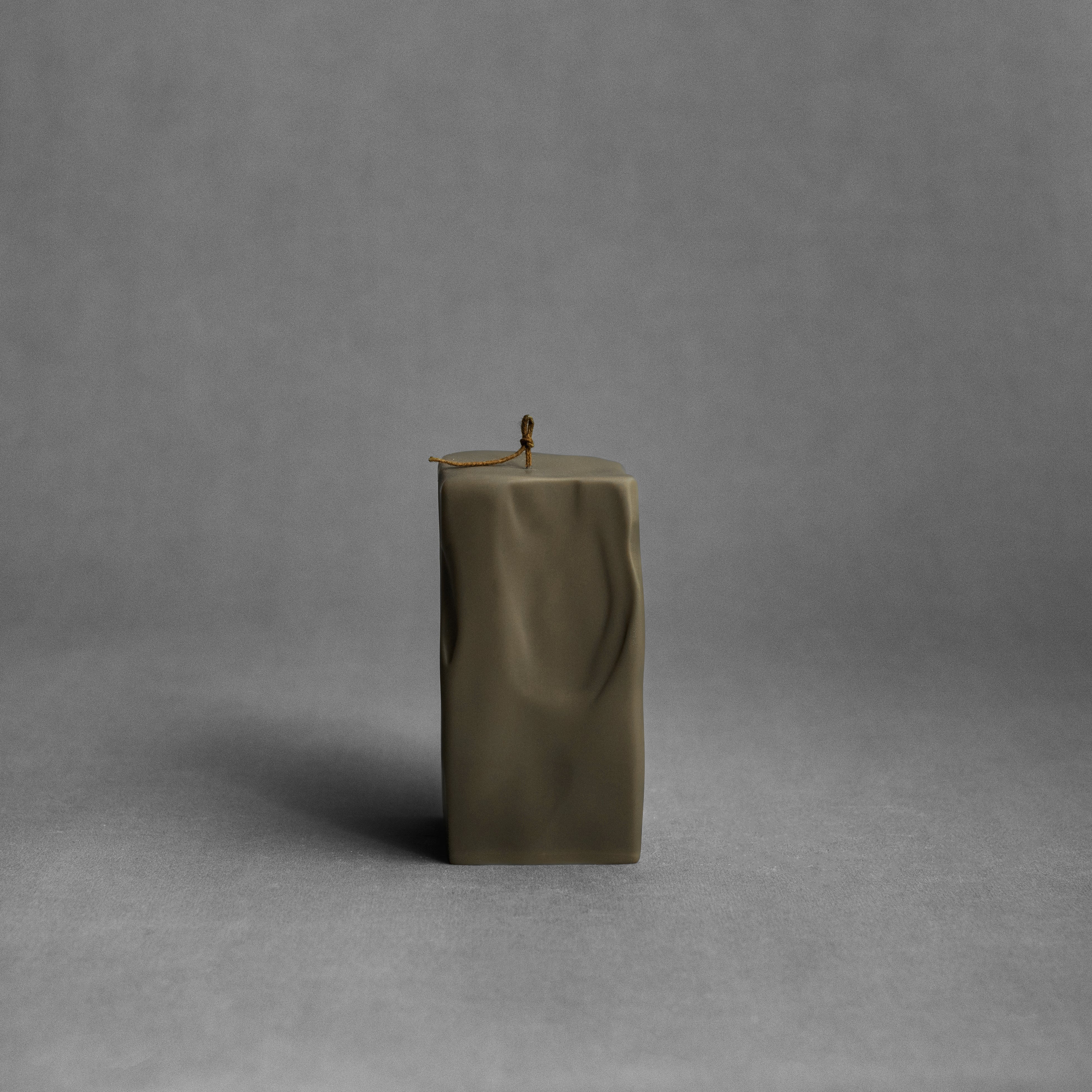 Large earthy green raw block pillar soy wax candle by LAWA, sculptural geometric decor piece in soy wax eco-friendly piece of interior