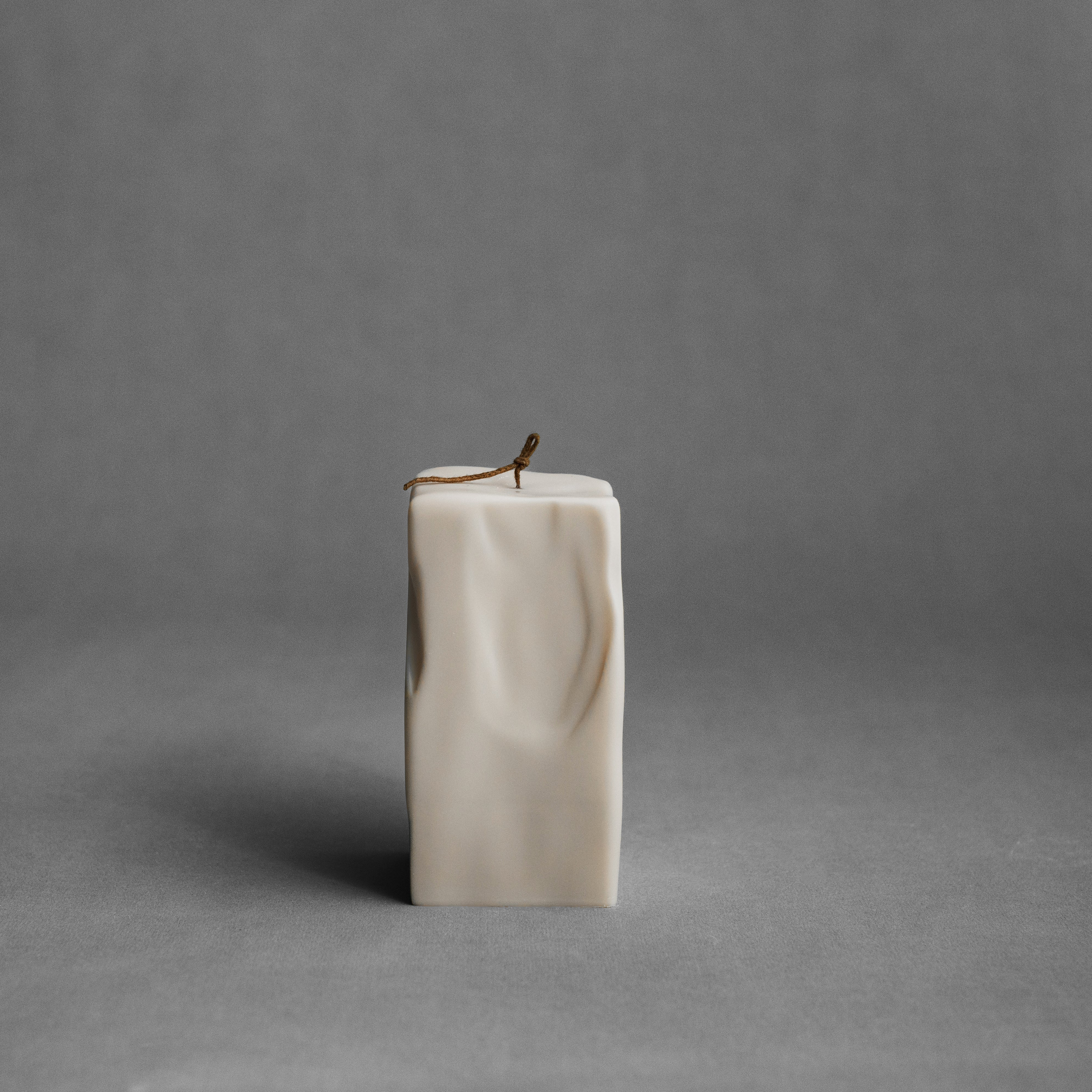 Raw Block sculptural candle handmade from soy wax displayed in minimalist Los Angeles interior setting