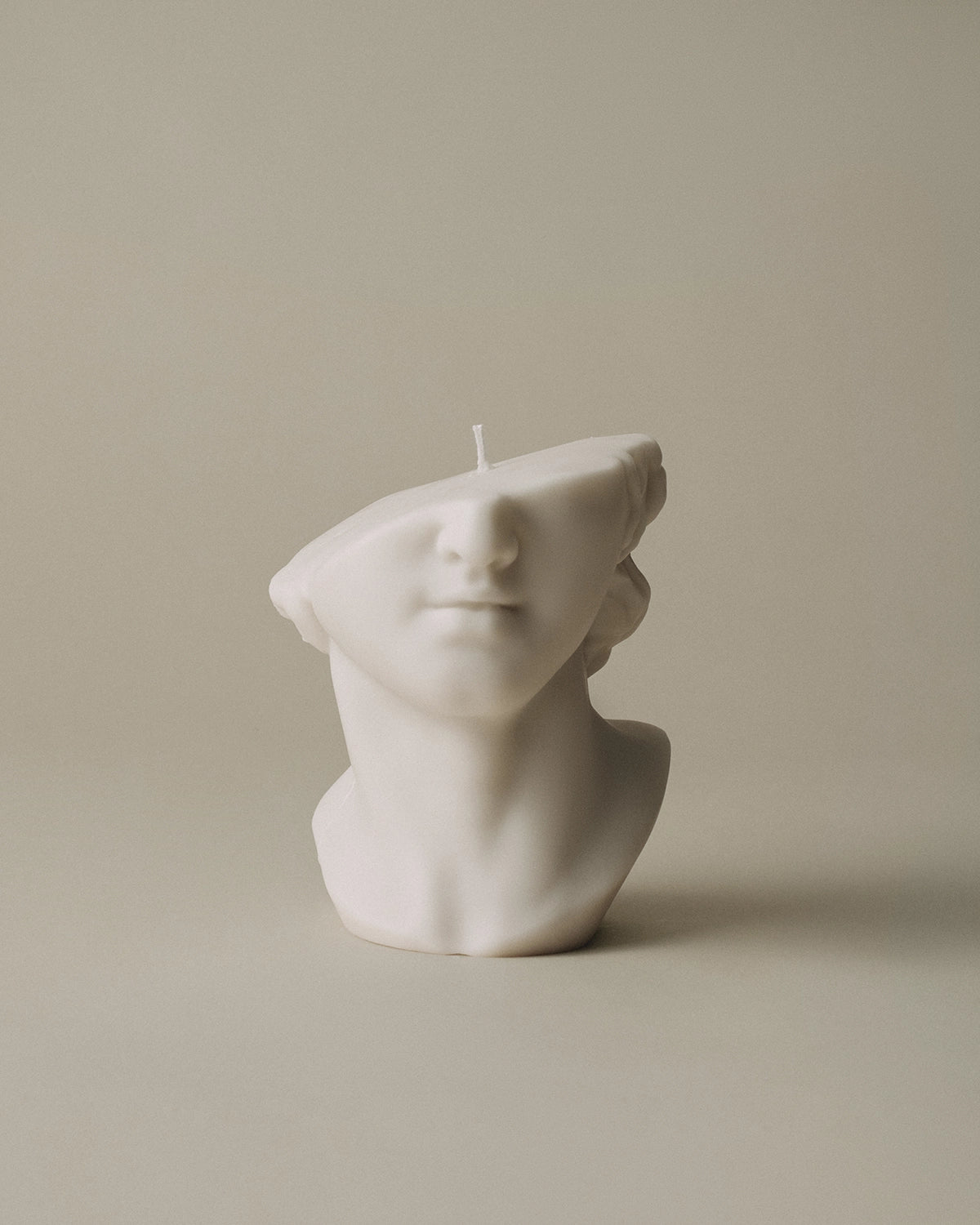 LAWA Candles Greek Statue Candle in White soy wax, product photo on a plain background