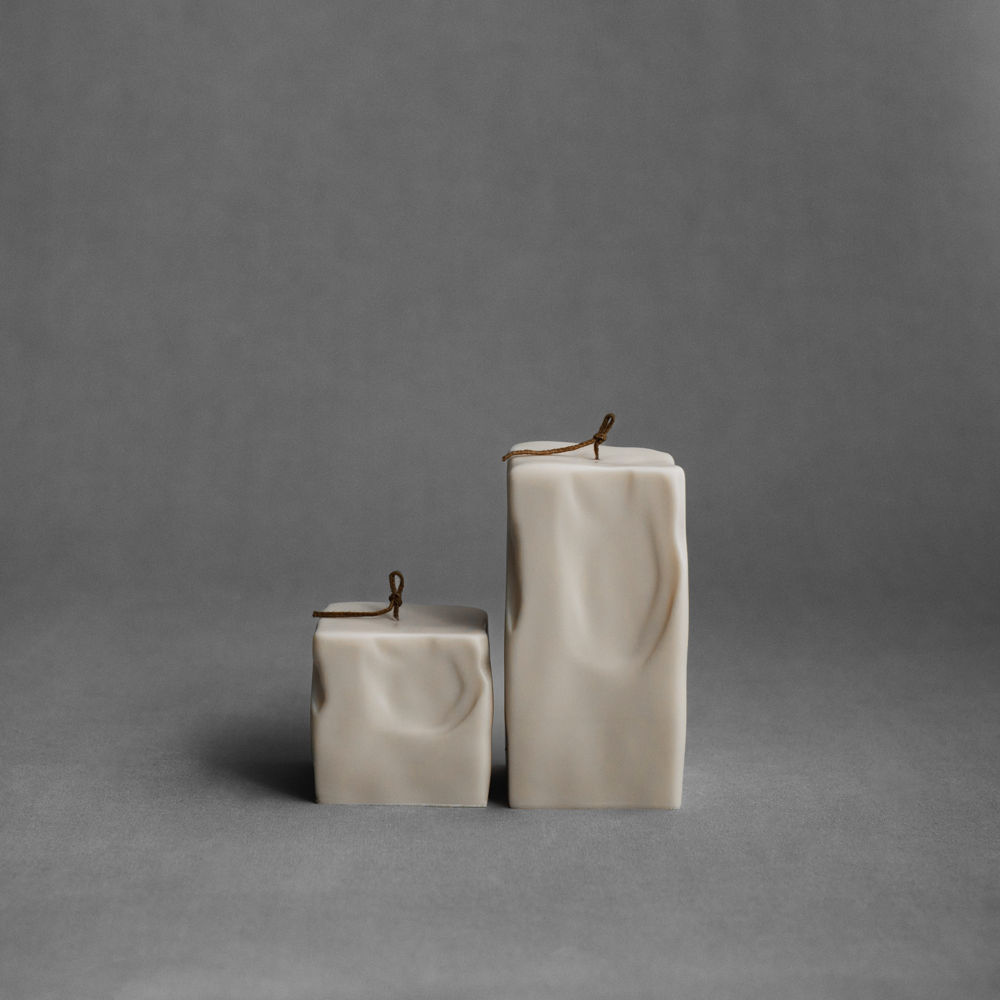 Light beige raw block candle set by LAWA featuring minimalist geometric natural shapes in natural soy wax