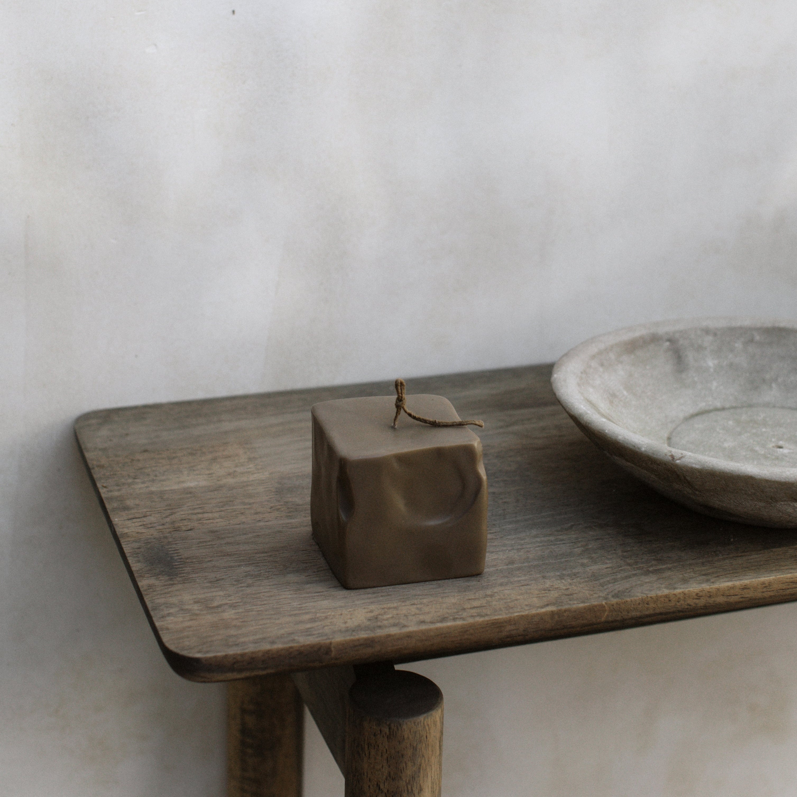 Raw Block sculptural candle handmade in Los Angeles displayed on minimalist surface showing geometric texture detail