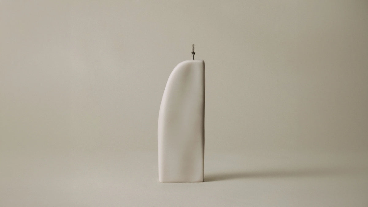 LAWA Candles Downhill Candle in Light Beige soy wax, product photo on a plain background