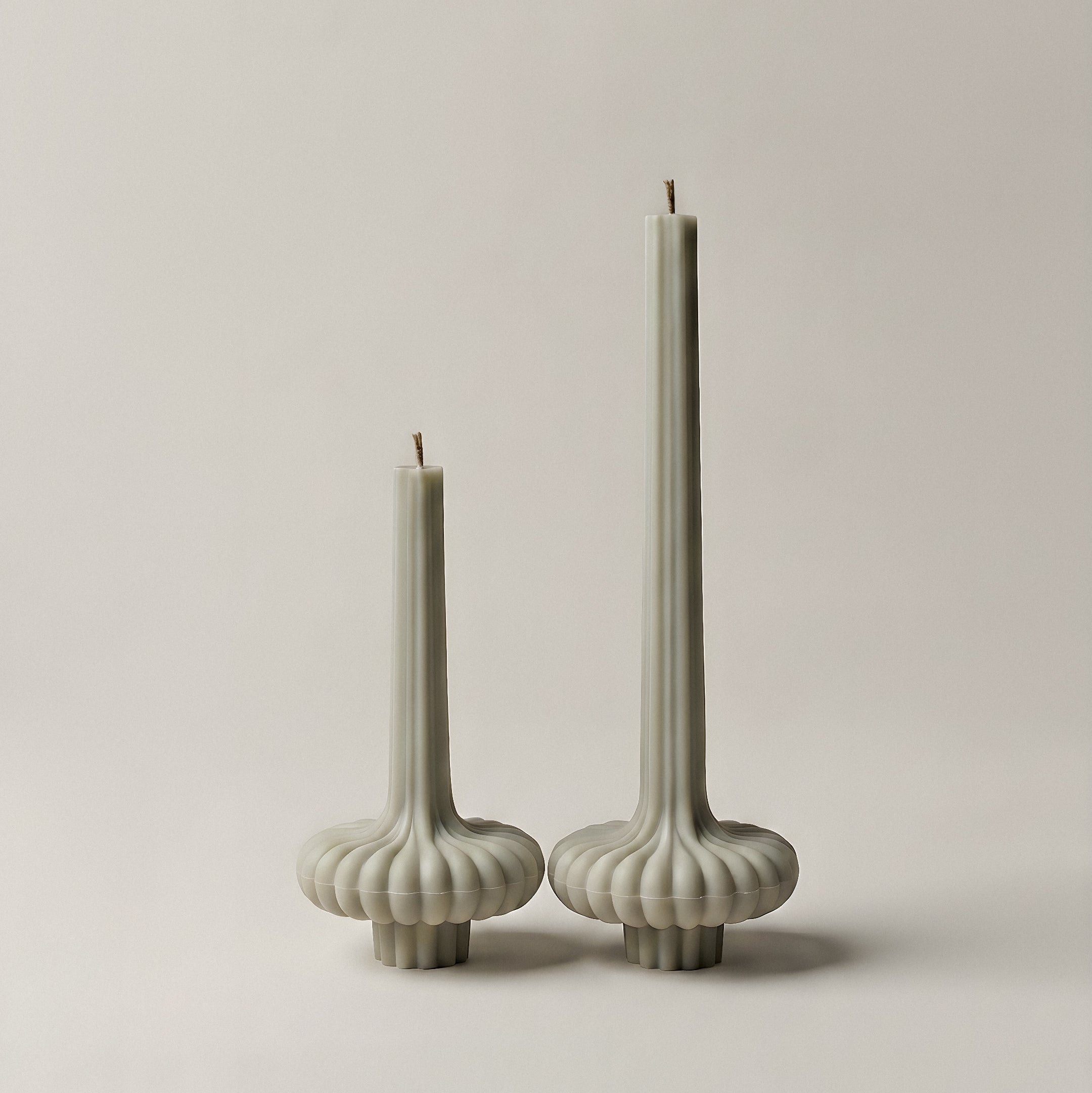 Close-up detail of handmade pumpkin sculptural candle showing premium soy wax texture and artisan craftsmanship