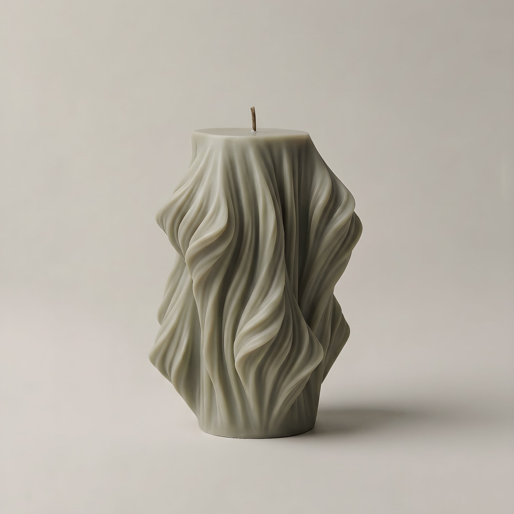 Close-up detail of handmade sculptural candle showing cascading wave texture in premium soy wax from Los Angeles