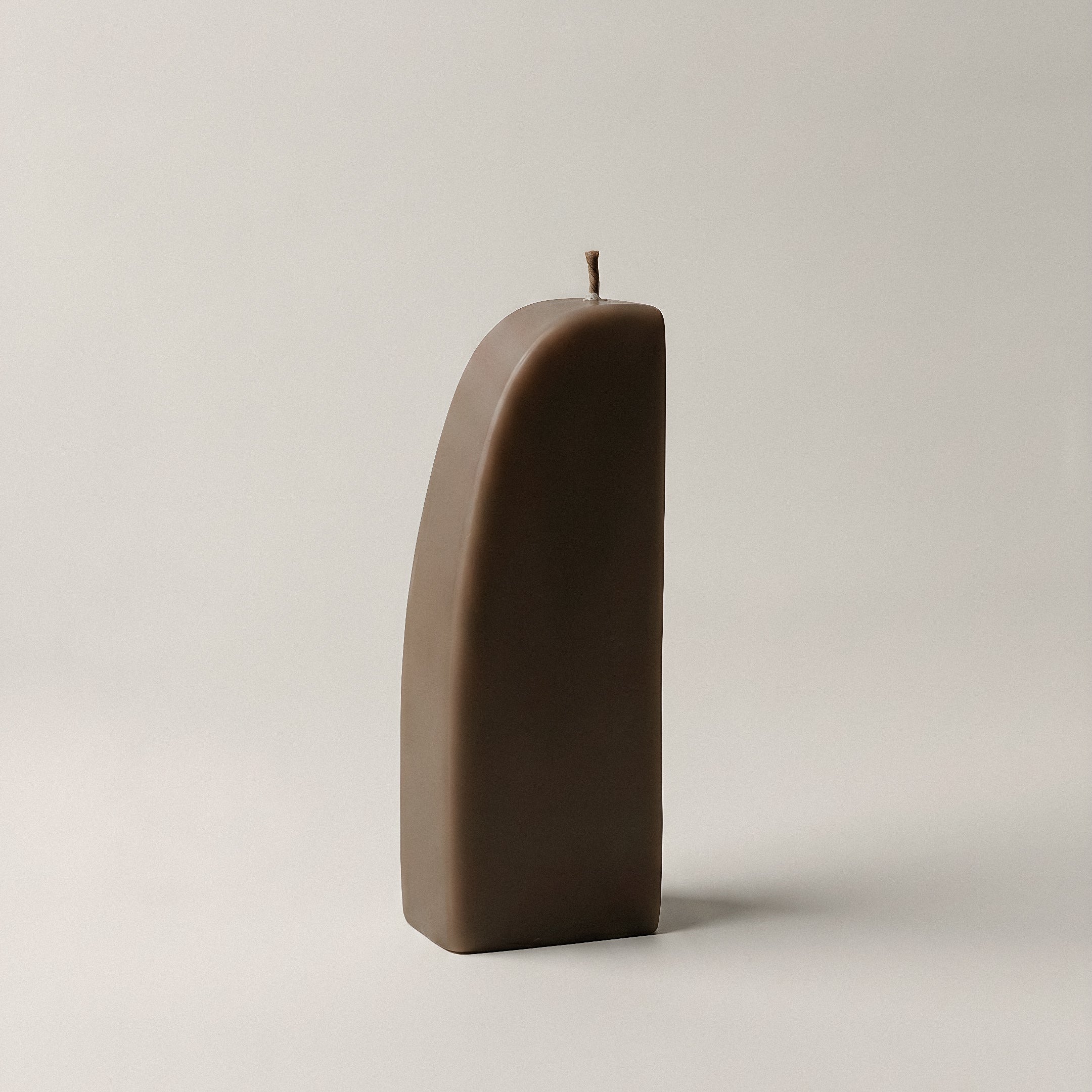 Close-up detail of handmade Downhill sculptural candle showing premium soy wax texture and cotton wick