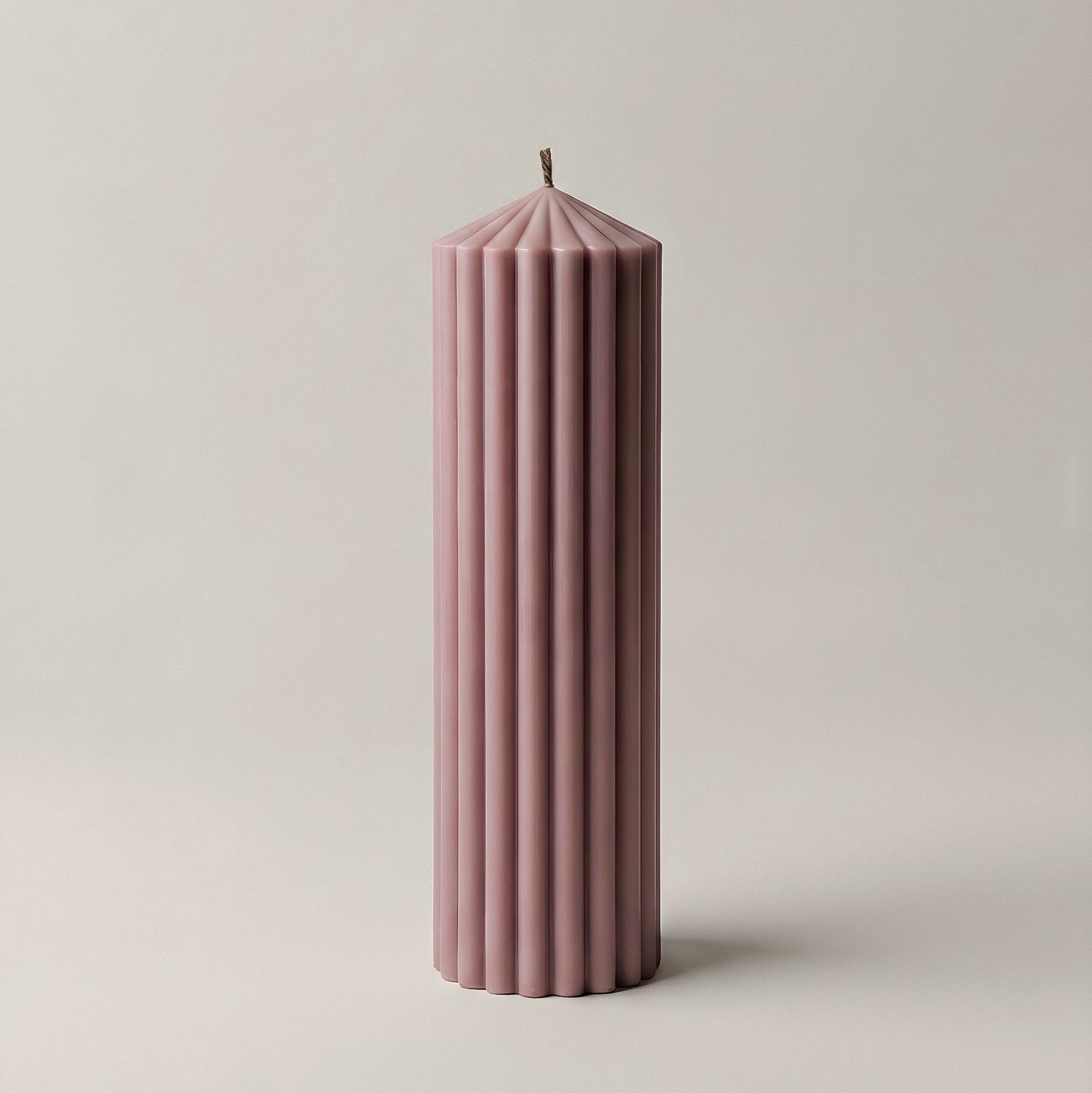 Peak sculptural candle handmade from soy wax displayed in minimalist Los Angeles home setting