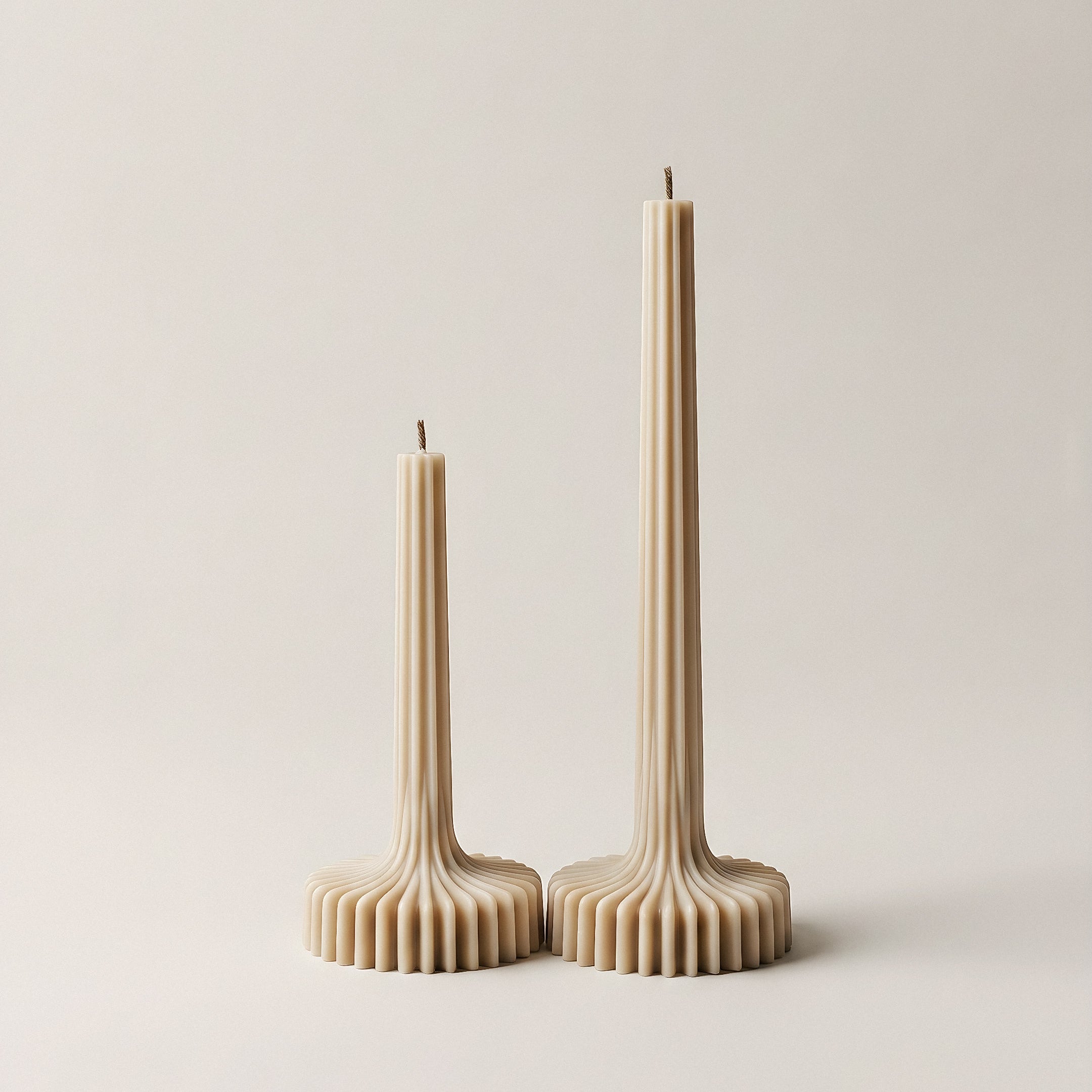 Close-up detail of handmade sculptural vase candle showing premium soy wax texture and organic curved form