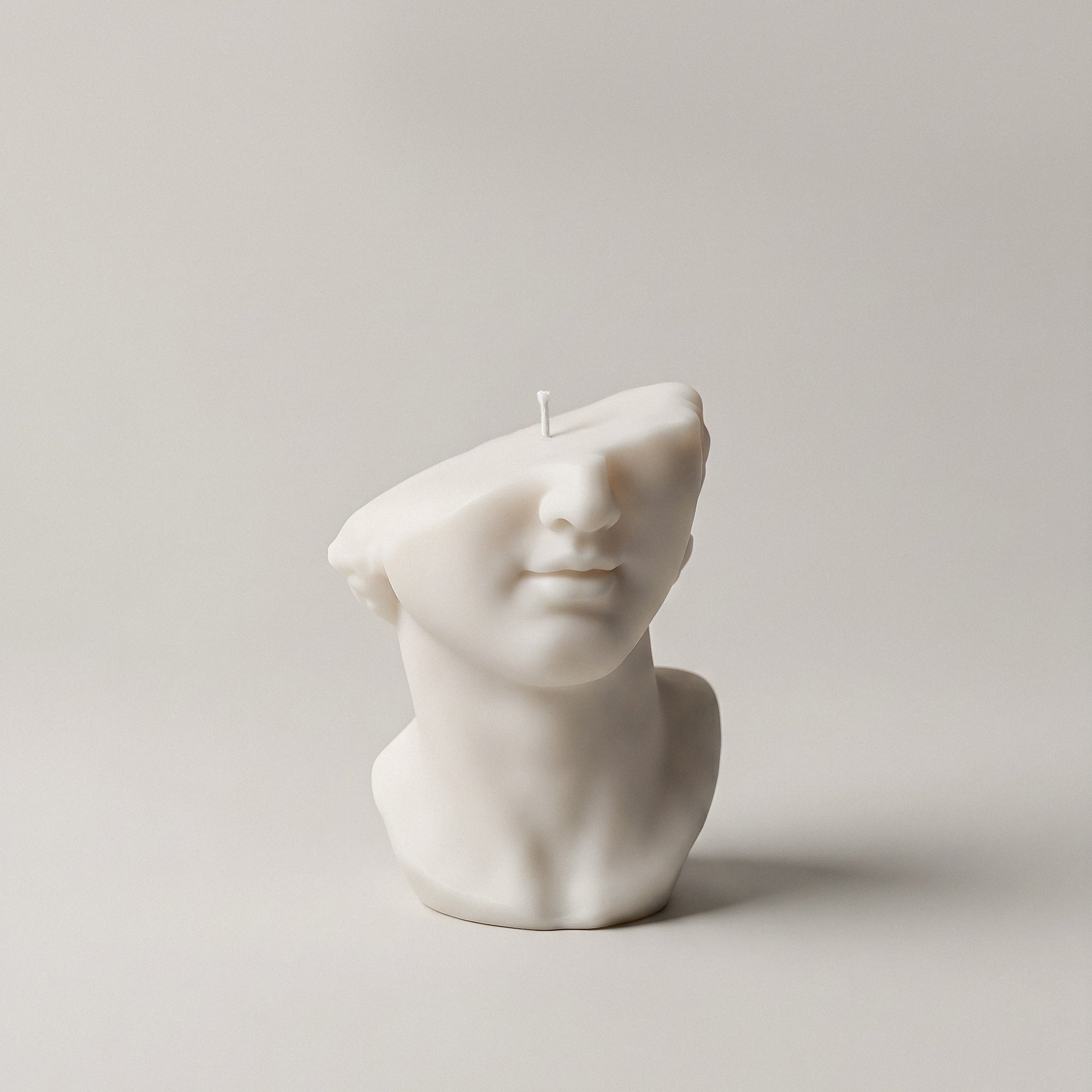 Greek statue sculptural candle detail showing premium soy wax texture and craftsmanship handmade in Los Angeles