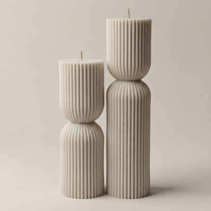 White hourglass sculptural candle made from premium soy wax, handmade in Los Angeles on a neutral background
