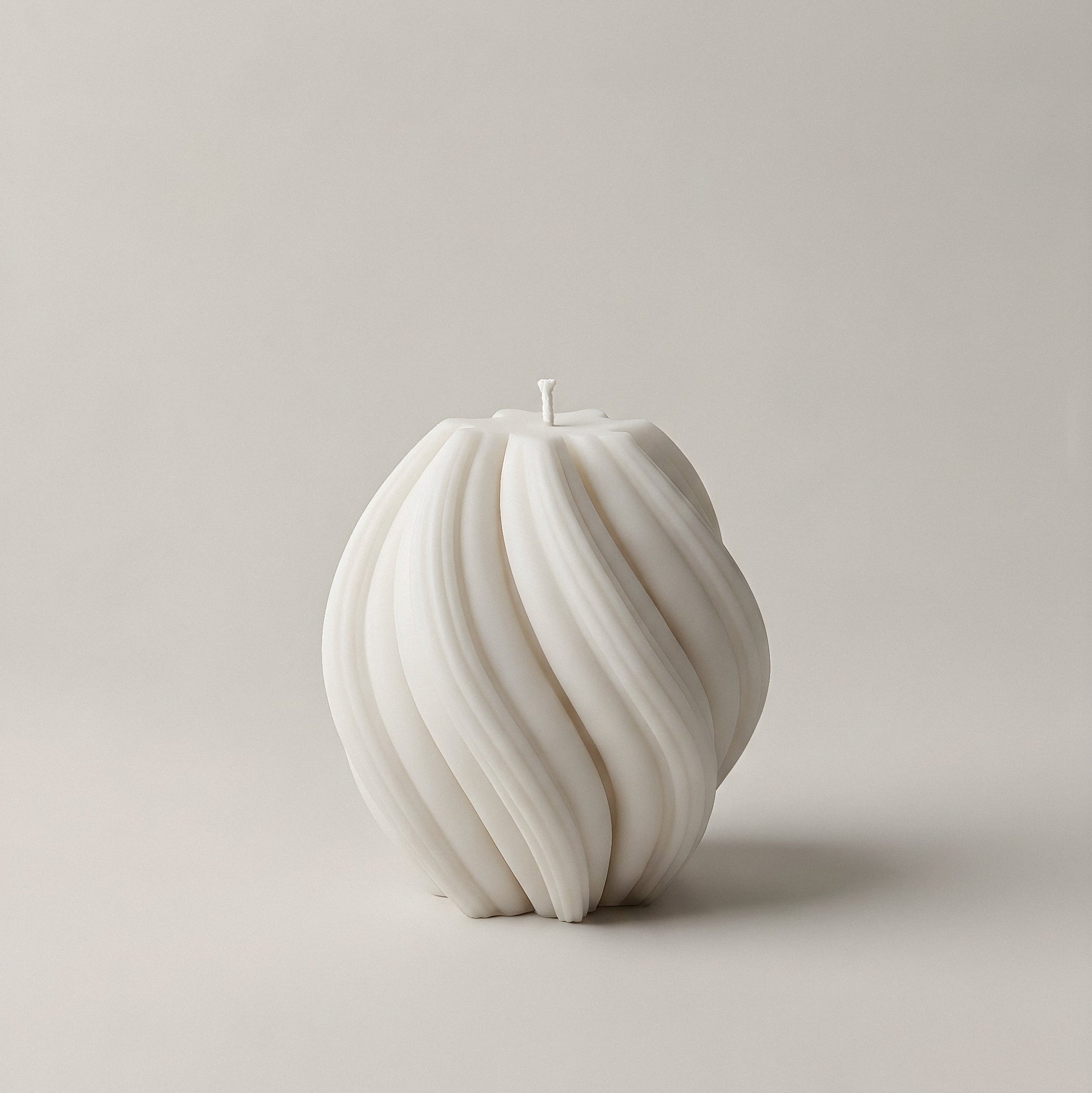 Handmade sculptural swirl candle detail showing premium soy wax texture and organic curves in Los Angeles studio