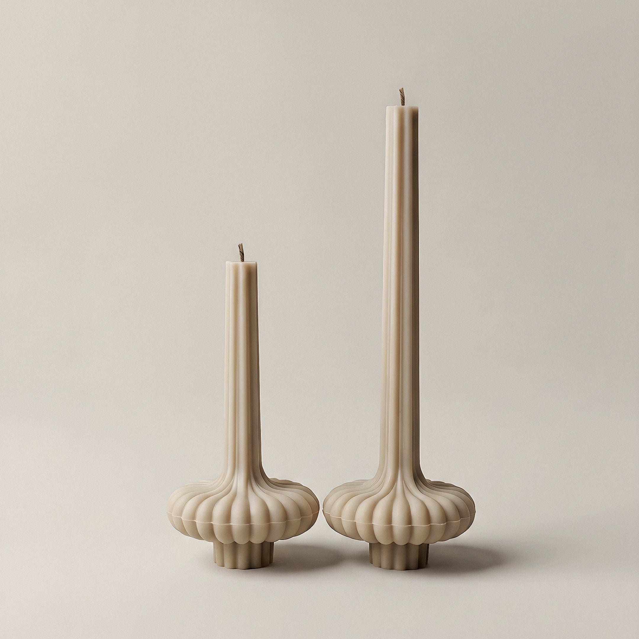 Close-up detail of handmade pumpkin sculptural candle showing premium soy wax texture and organic shape
