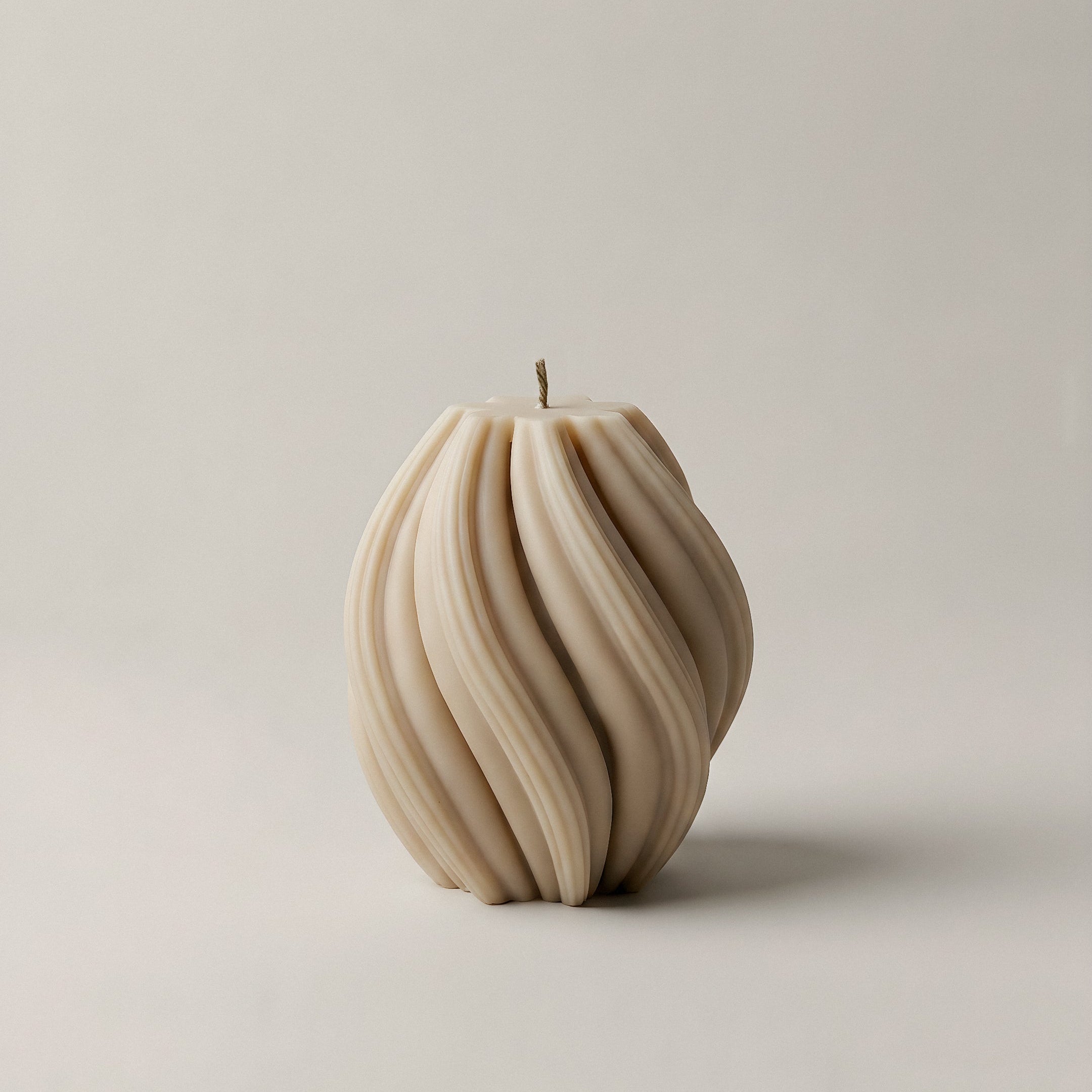 Handmade unscented swirl sculptural candle detail showing premium soy wax texture in Los Angeles studio setting