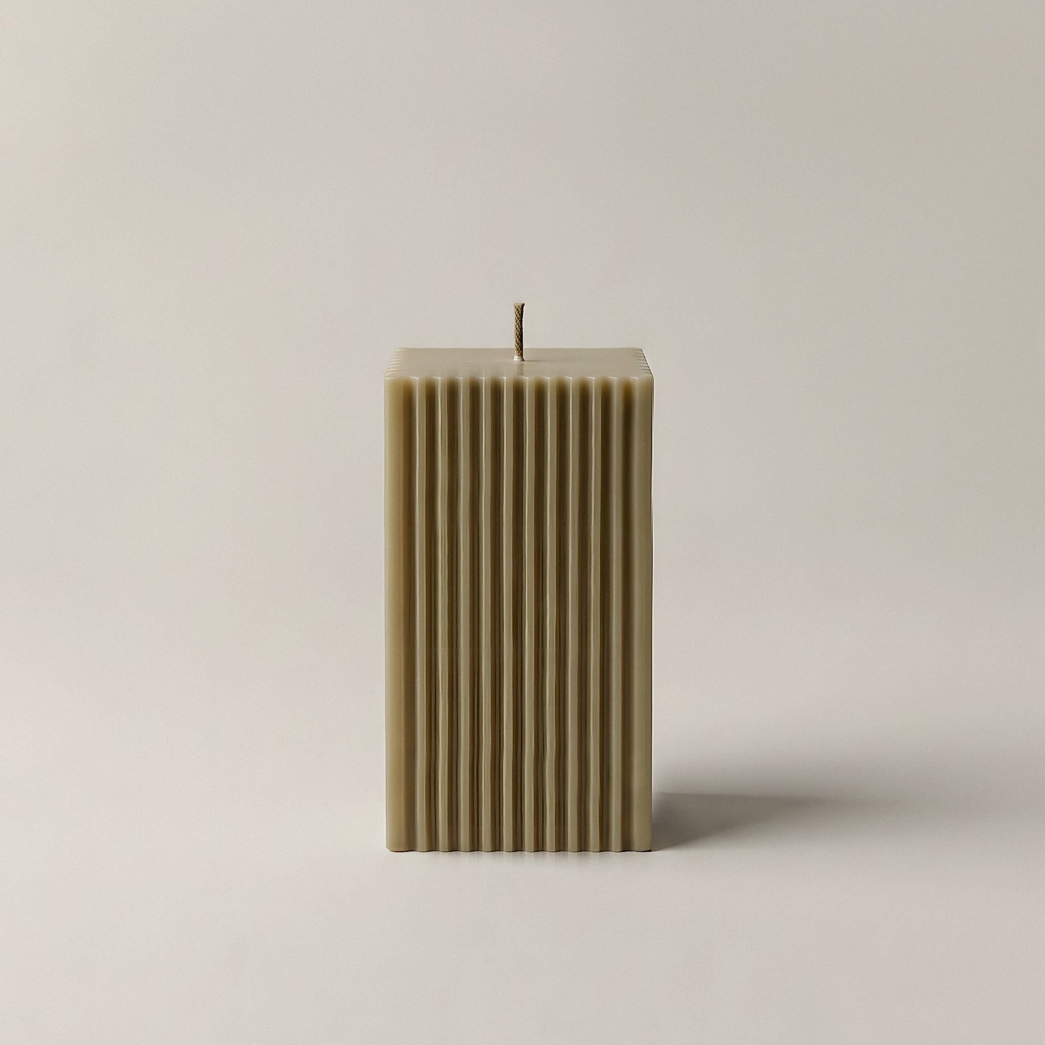 Square ribbed sculptural candle detail showing textured geometric pattern in premium soy wax handmade in Los Angeles