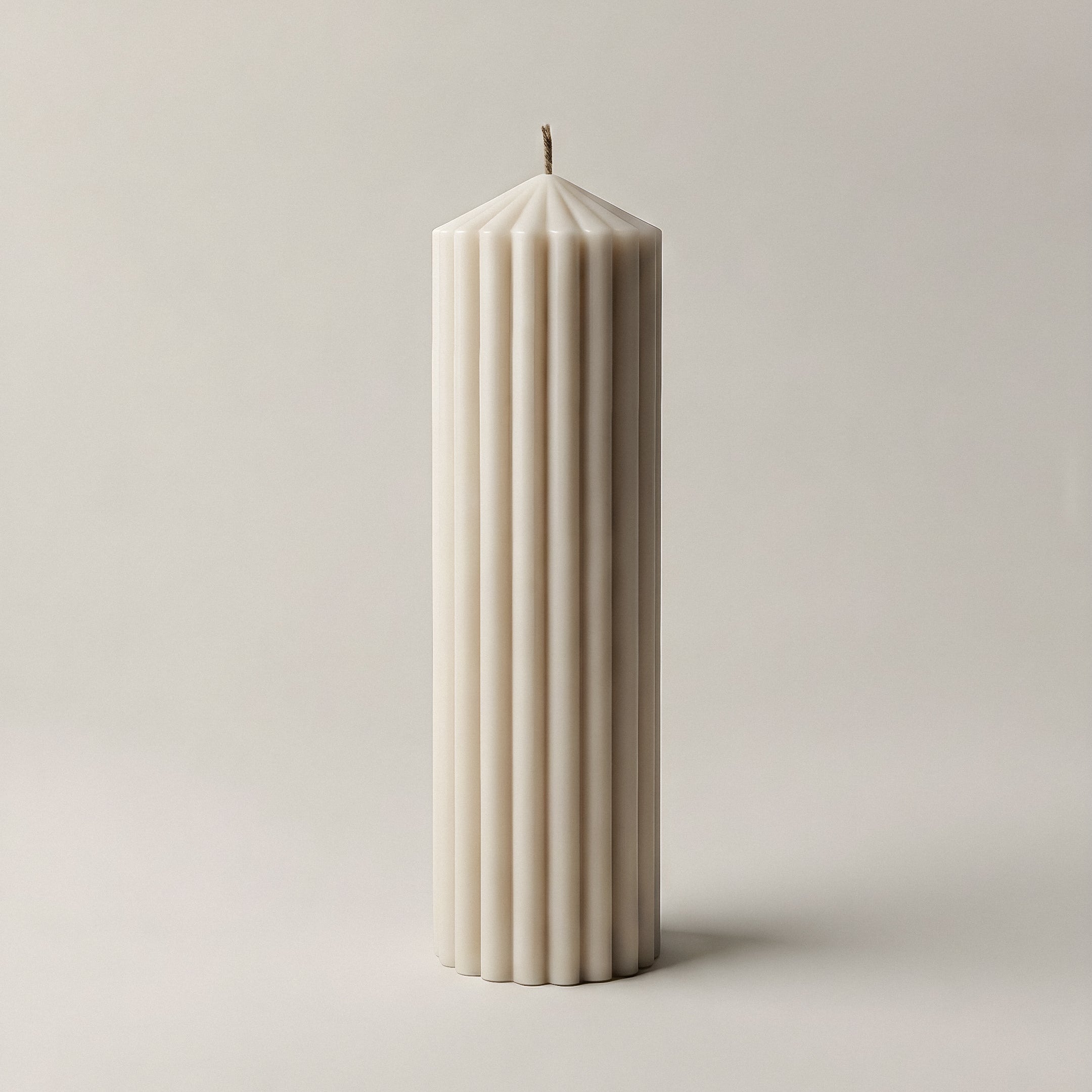 Close-up detail of handmade Peak sculptural candle showing premium soy wax texture and natural cotton wick
