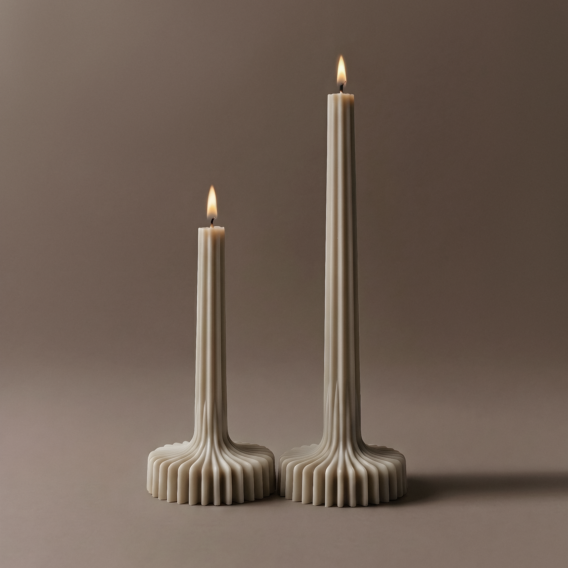 Close-up of handmade sculptural vase candle showing smooth soy wax texture and natural cotton wick detail