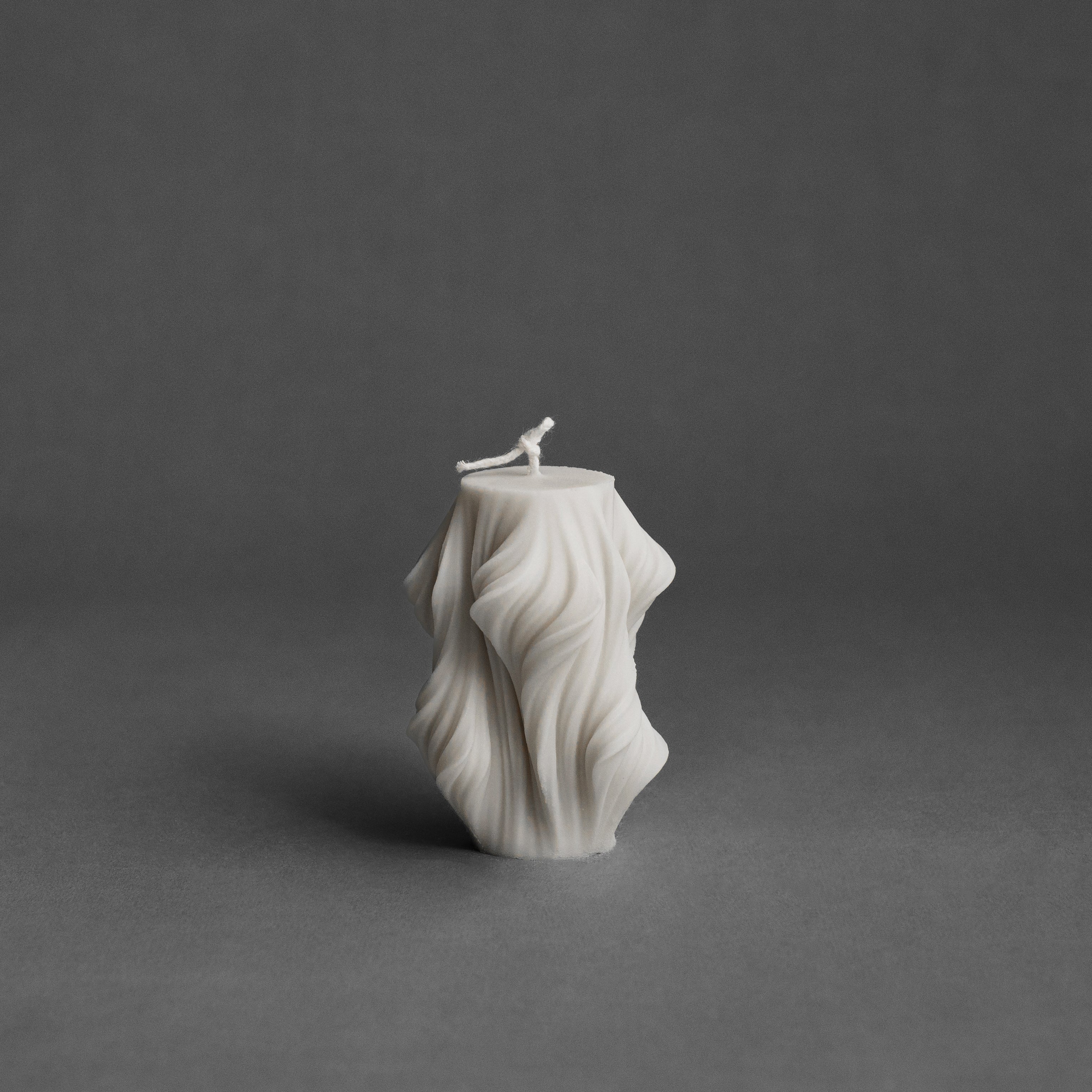 White cascading small pillar candle by LAWA with tiered sculptural steps