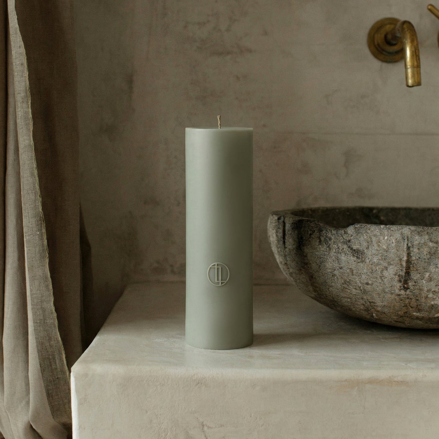 Handmade unscented cylinder candle detail showing smooth soy wax texture and minimalist sculptural design