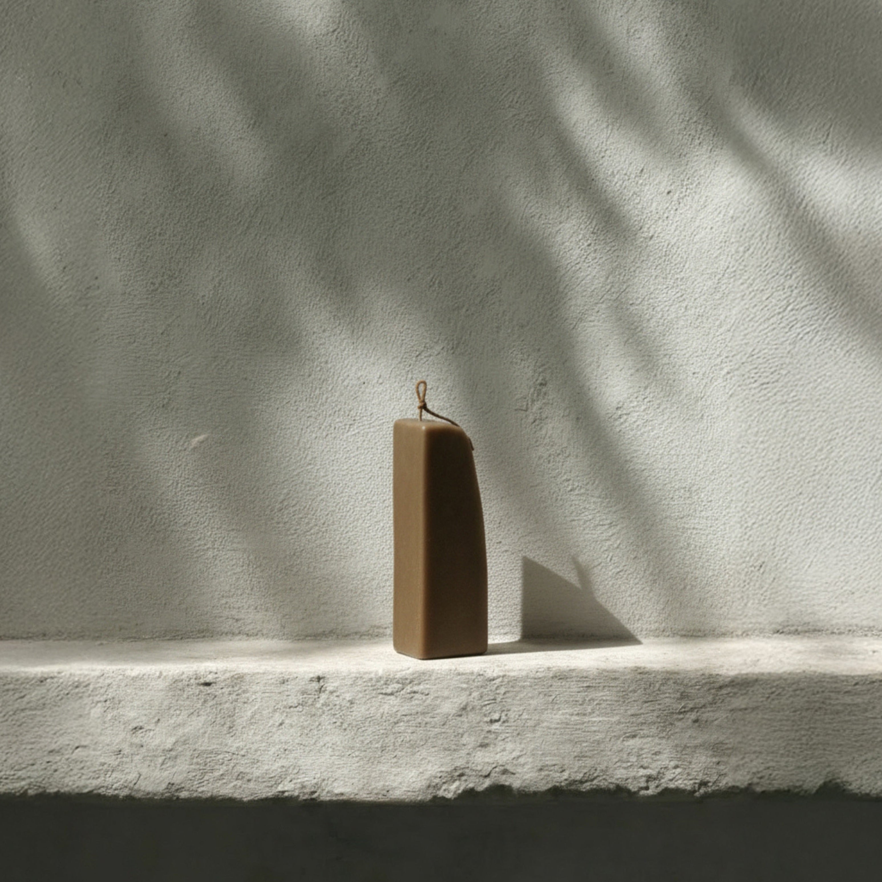 Kobicha brown downhill sculptural soy wax candle by LAWA, modern curved shape for minimalist home decor and gifts