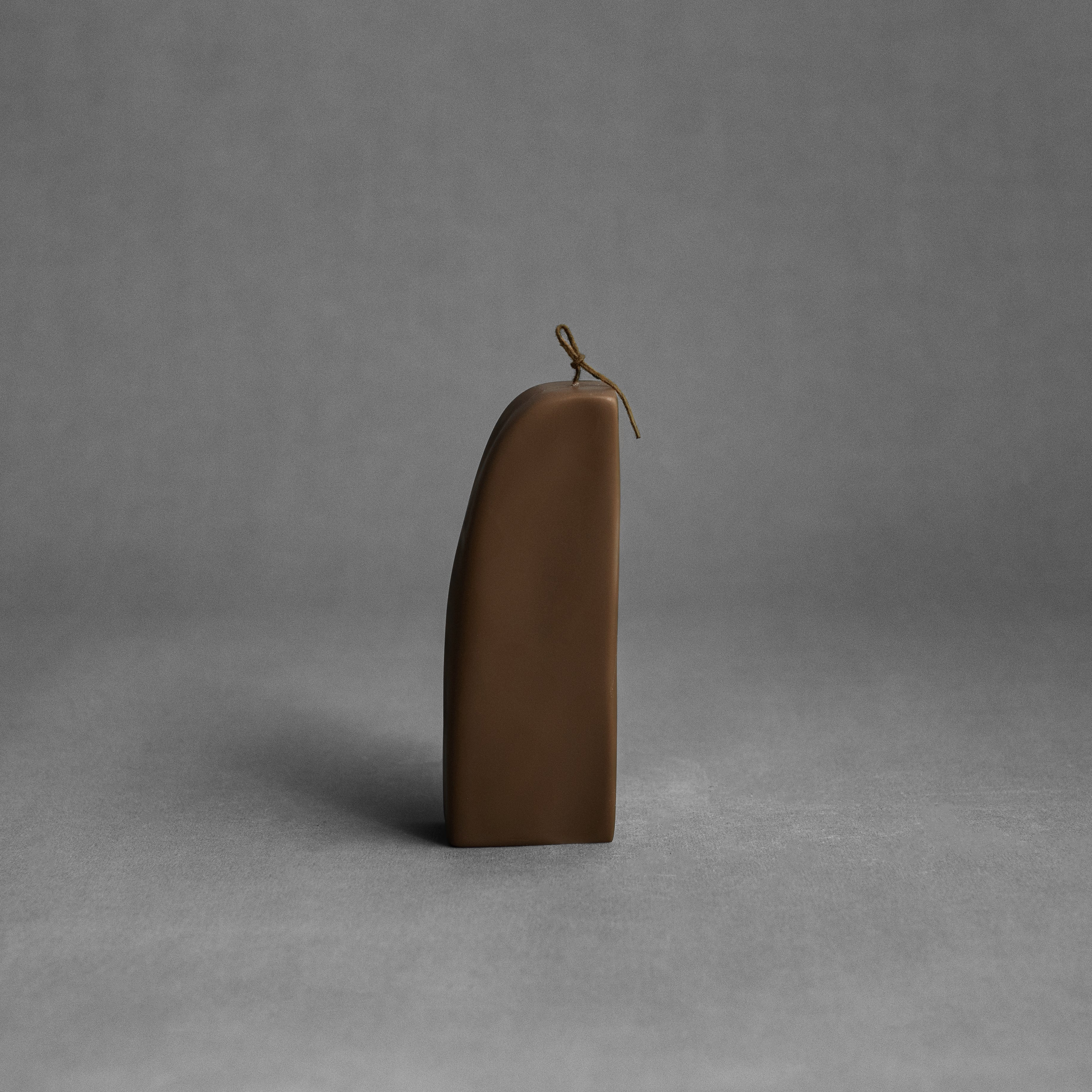 Kobicha brown downhill sculptural soy wax candle by LAWA, modern curved shape for minimalist home decor