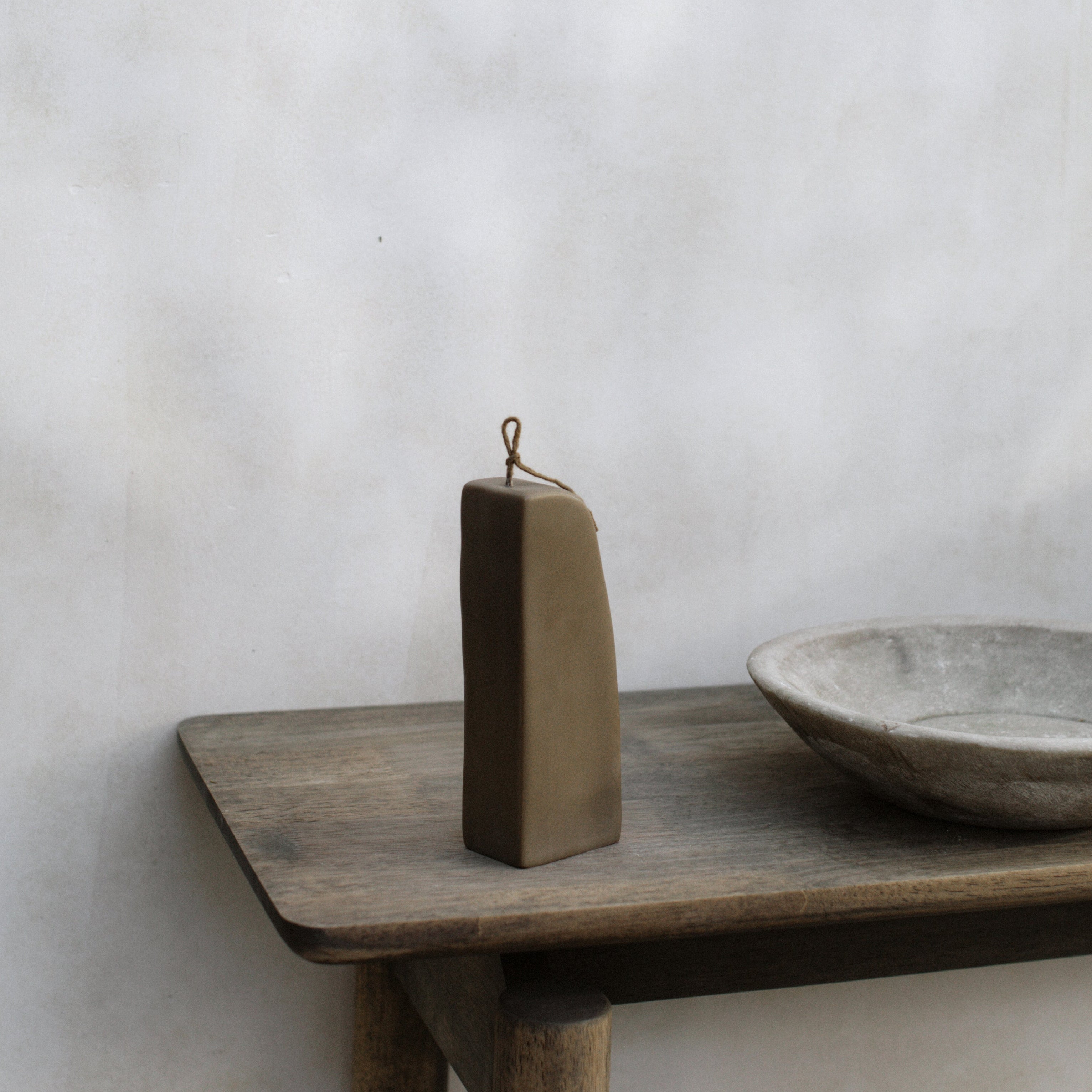 Kobicha brown downhill sculptural soy wax candle by LAWA, modern curved shape for minimalistic table decor, gift idea, and housewarming gift