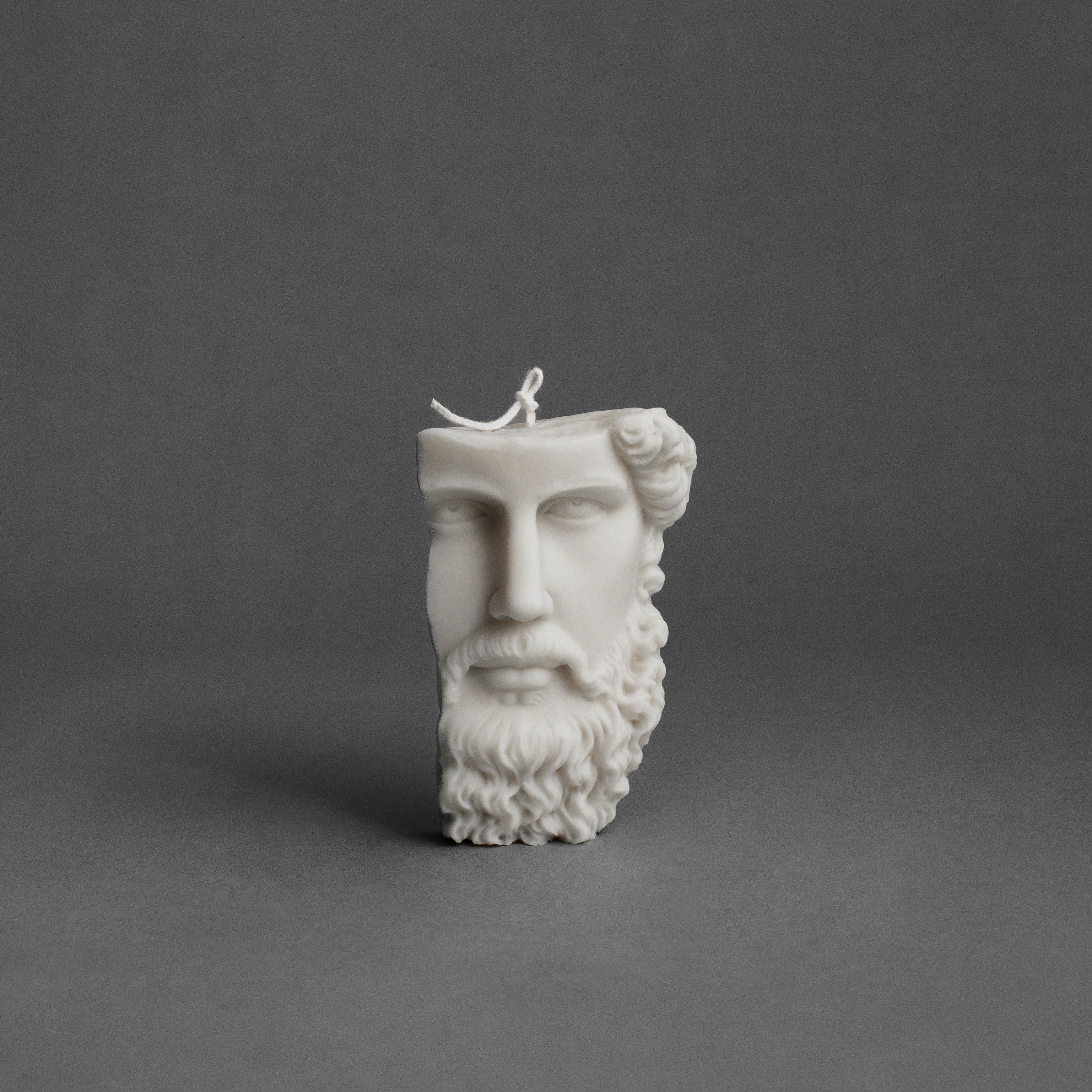 Minimalist white Greek face candle by LAWA, detailed classical sculpted face design in soy wax