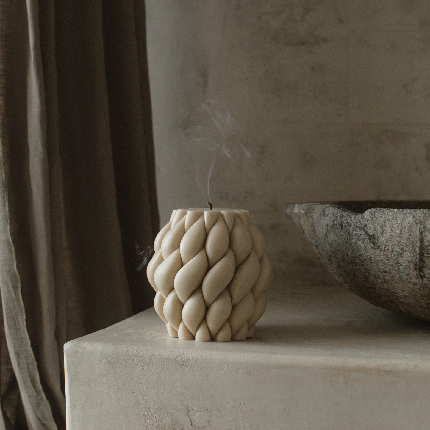 Handmade sculptural knot ball candle detail showing premium soy wax texture and cotton wick from Los Angeles