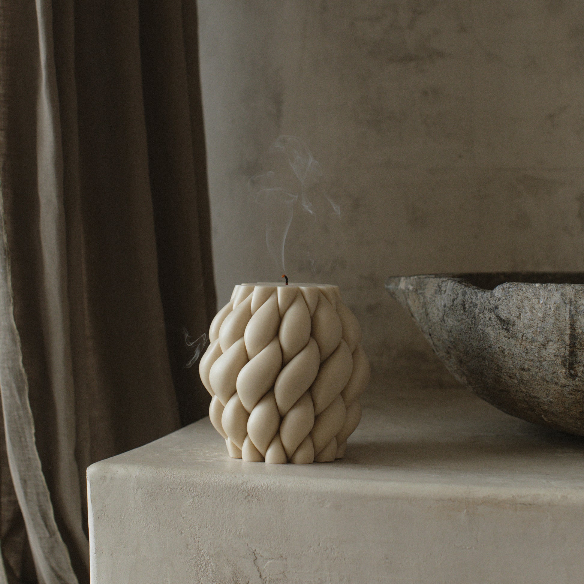 Handmade sculptural knot ball candle detail showing premium soy wax texture and cotton wick from Los Angeles