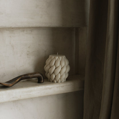 Handmade sculptural candle with intertwined knot design made from premium soy wax in Los Angeles studio