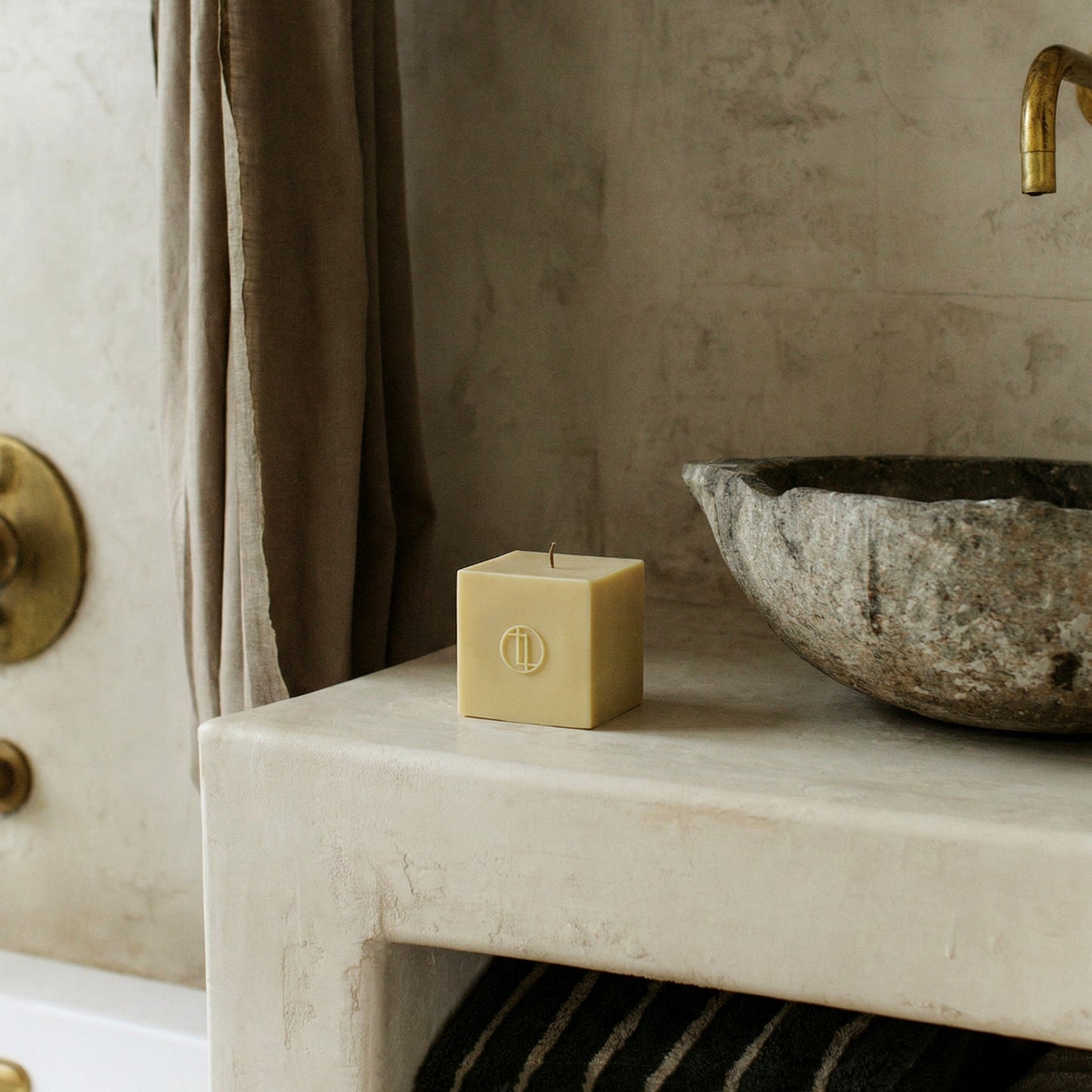 Handmade sculptural block candle detail showing premium soy wax texture and cotton wick from Los Angeles