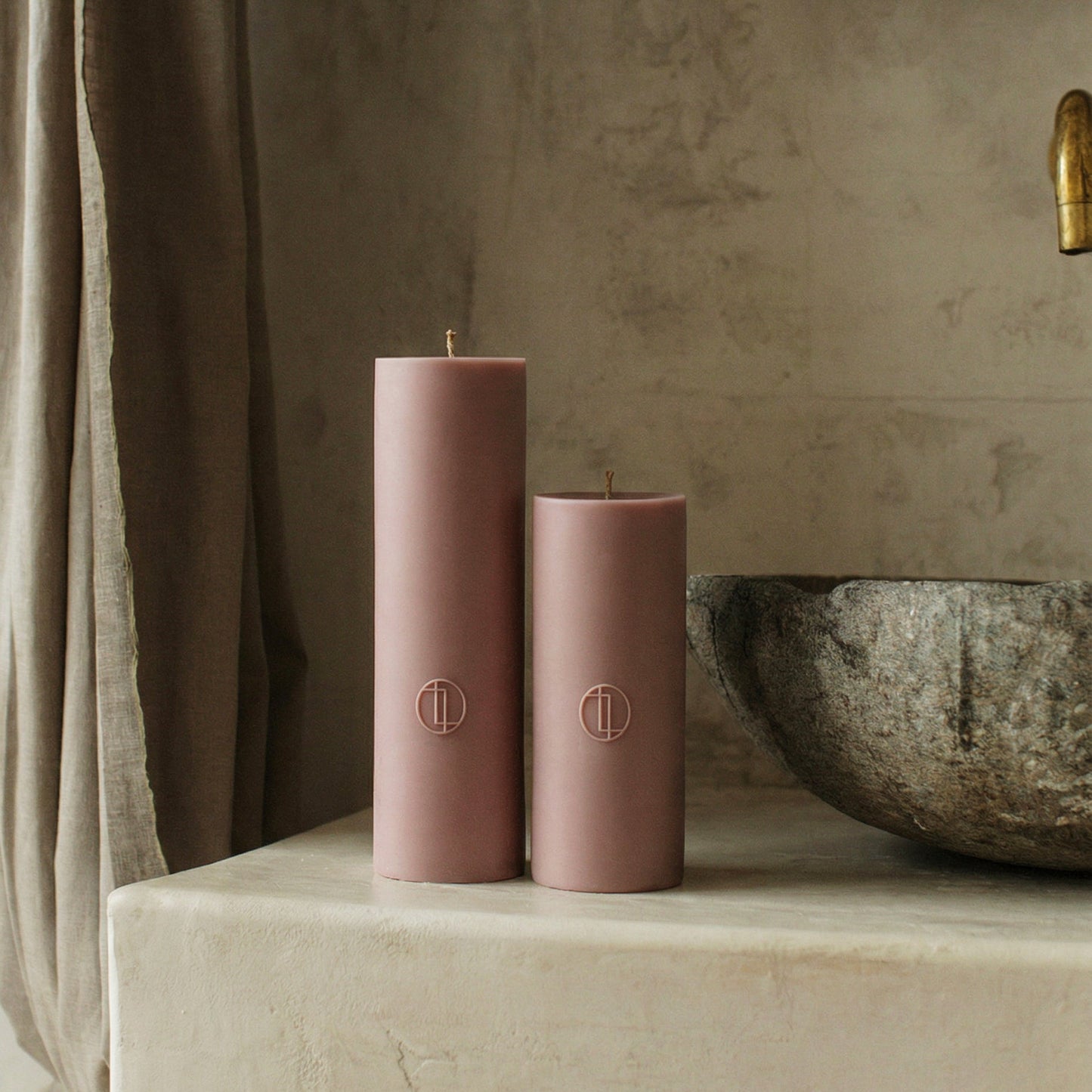 Close-up detail of handmade unscented cylinder candle showing smooth soy wax texture and cotton wick in Los Angeles studio
