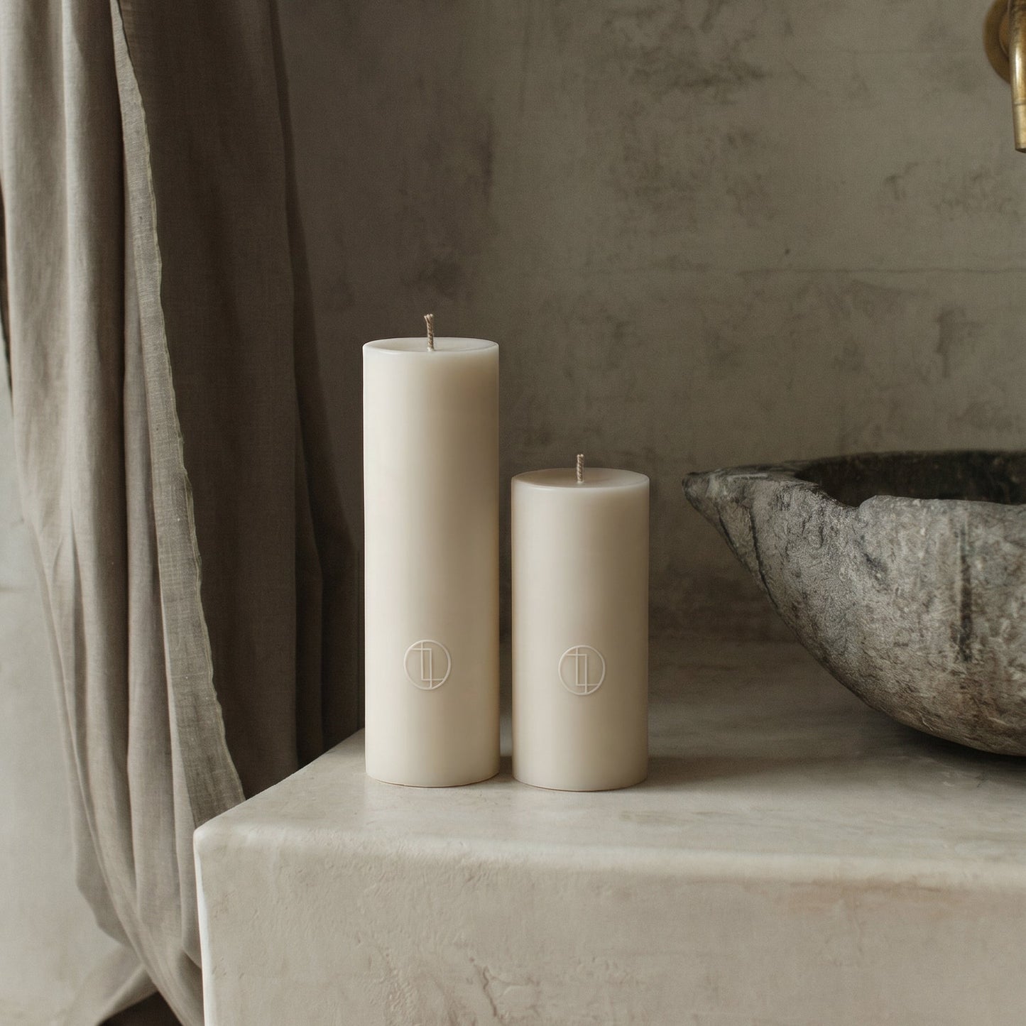 Close-up detail of handmade unscented cylinder candle showing premium soy wax texture and cotton wick