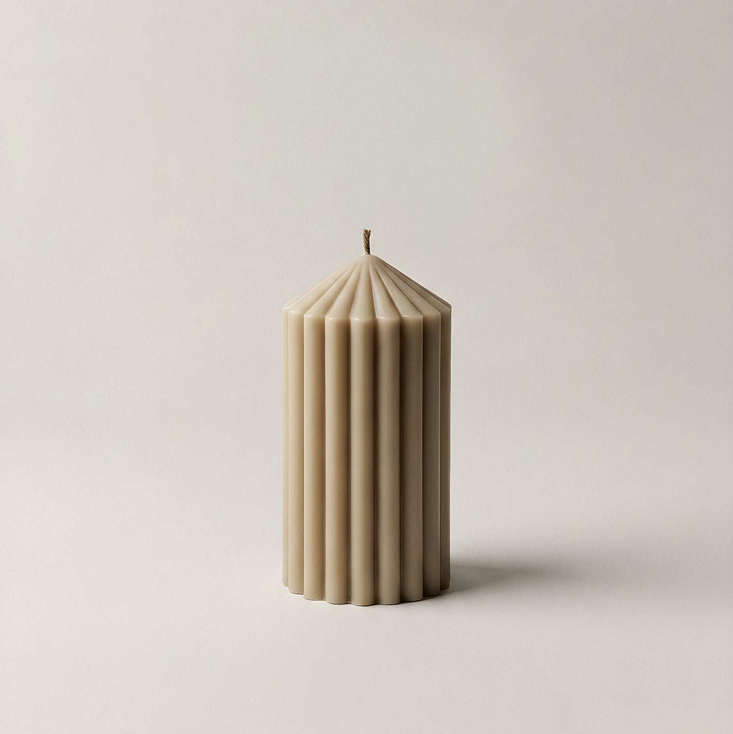 Close-up detail of handmade Peak sculptural candle showing premium soy wax texture and natural cotton wick