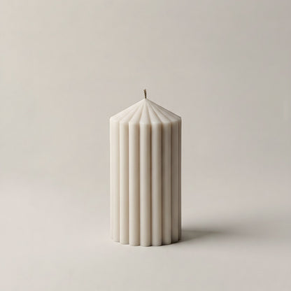 Detail of handmade Peak sculptural candle showing premium soy wax texture and cotton wick closeup