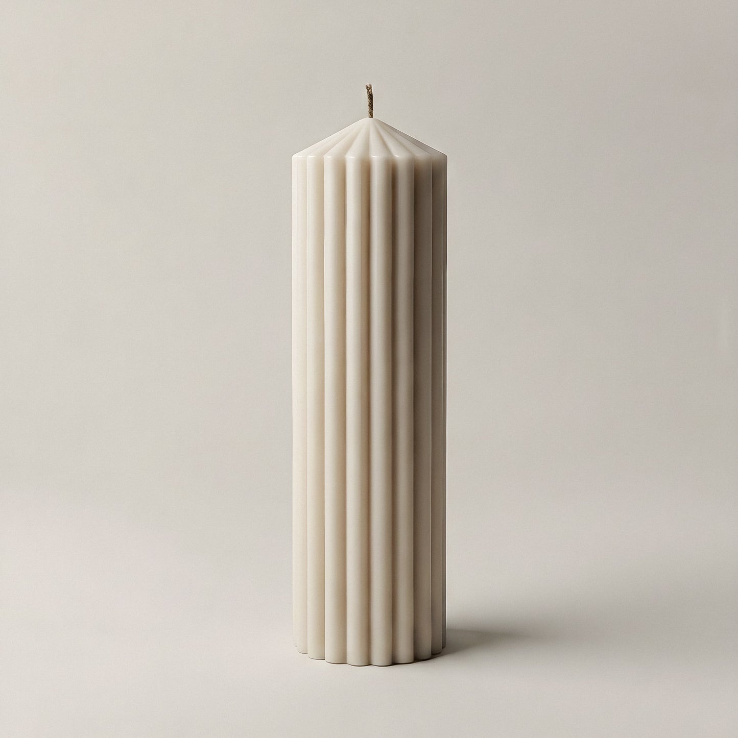 Close-up detail of handmade Peak sculptural candle showing premium soy wax texture and natural cotton wick