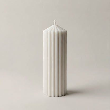 Close-up detail of handmade Peak sculptural candle showing smooth soy wax texture and natural cotton wick