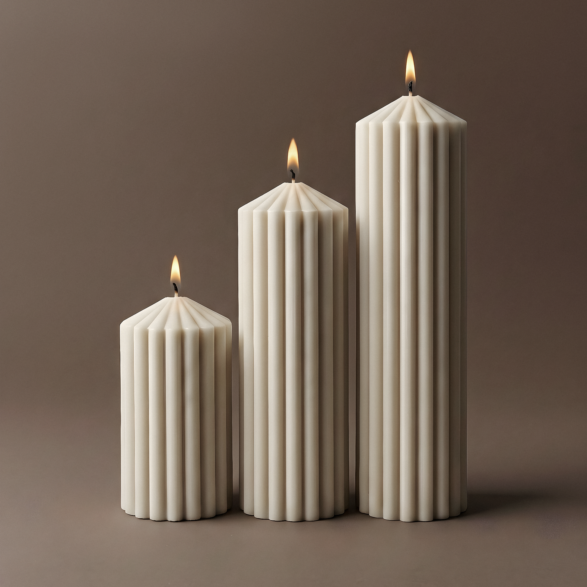 LAWA Candles Peak Candle in White soy wax featuring fluted ribs rising to a tapered peak, product photo on a plain background