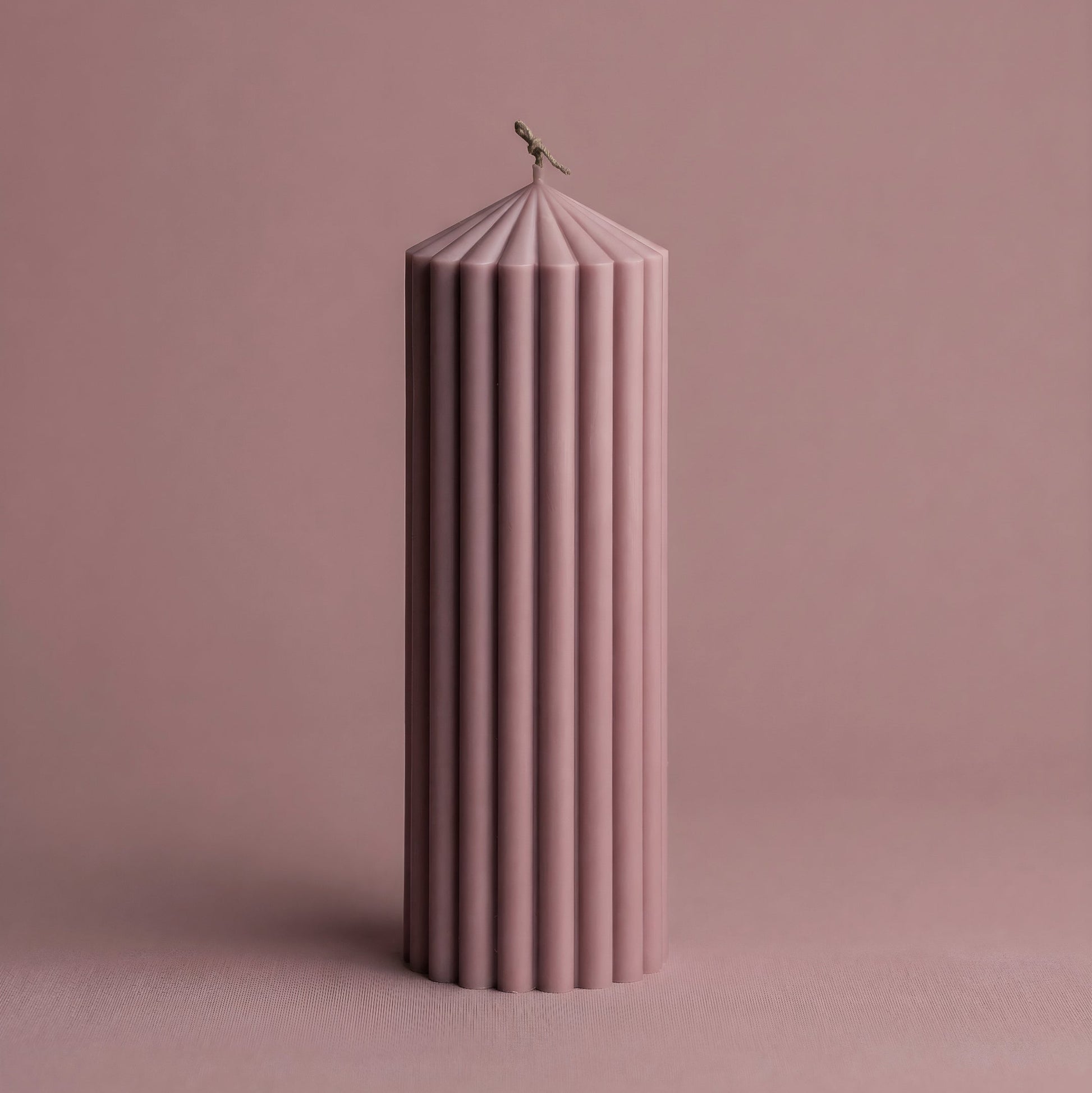Close-up detail of handmade Peak sculptural candle showing premium soy wax texture and modern geometric design