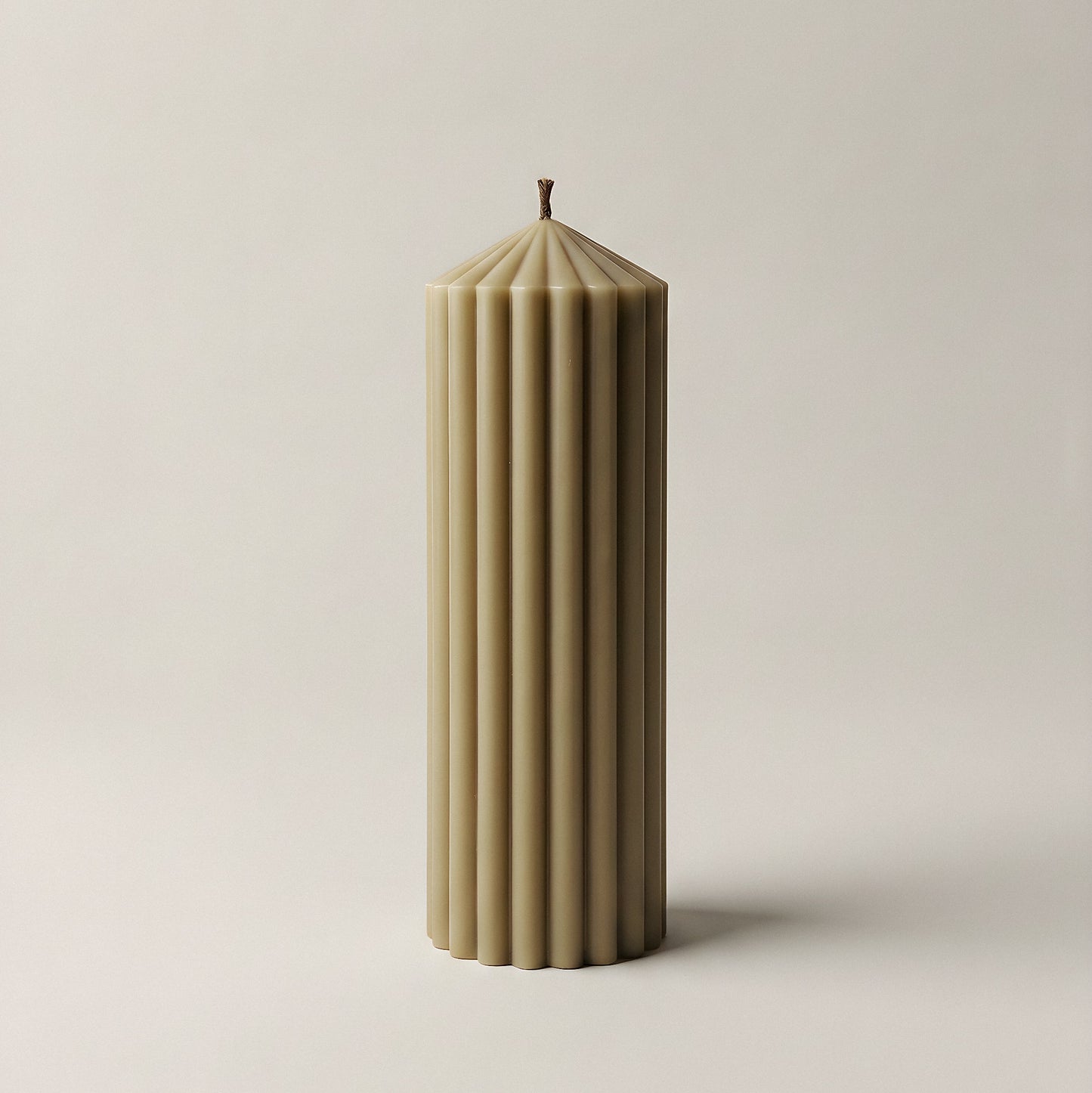 Close-up detail of handmade Peak sculptural candle showing premium soy wax texture and natural cotton wick
