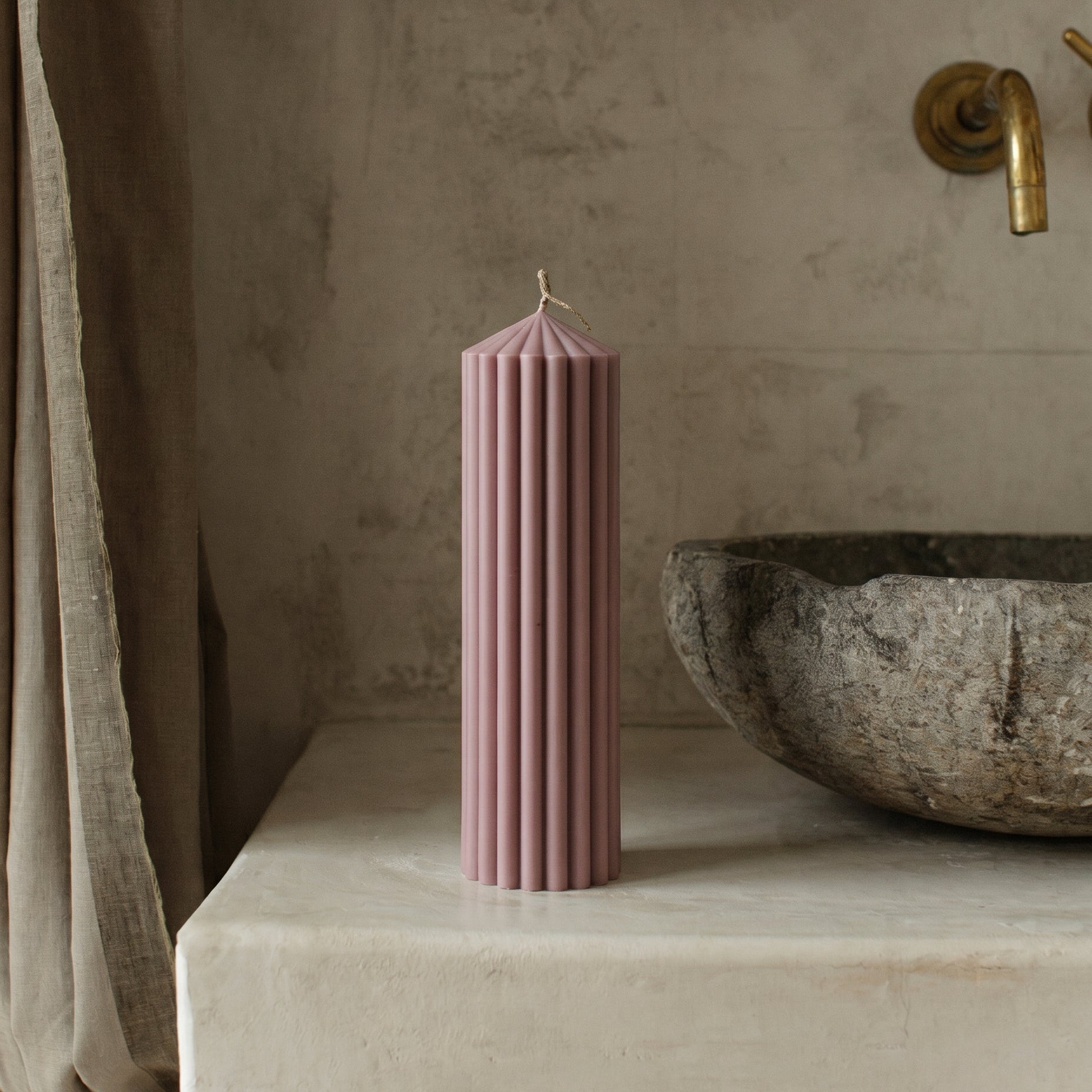 Peak sculptural candle handmade from natural soy wax displayed in minimalist Los Angeles home setting