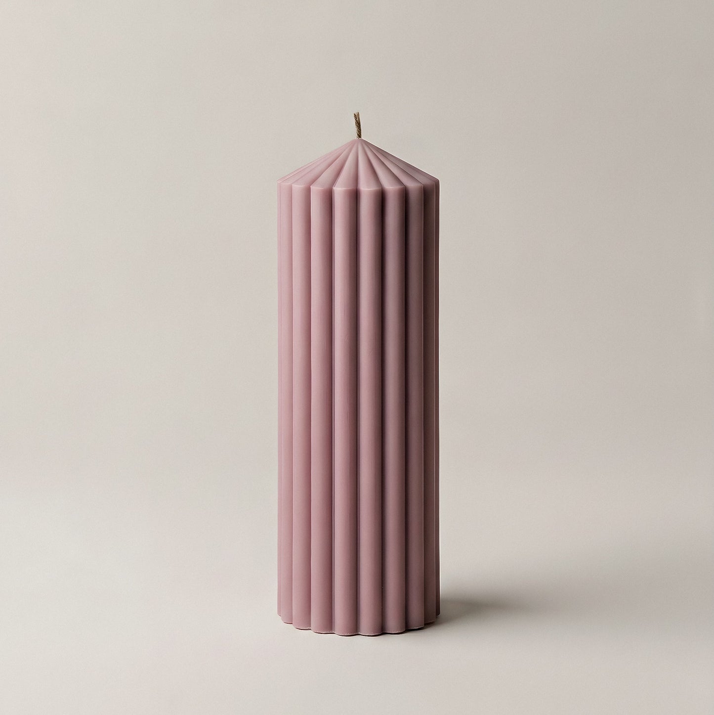 Peak Candle sculptural soy wax candle styled on minimalist shelf in natural light showcasing handmade LA craftsmanship
