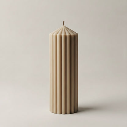 Peak sculptural candle handmade in Los Angeles displayed in modern interior with natural lighting and minimal decor
