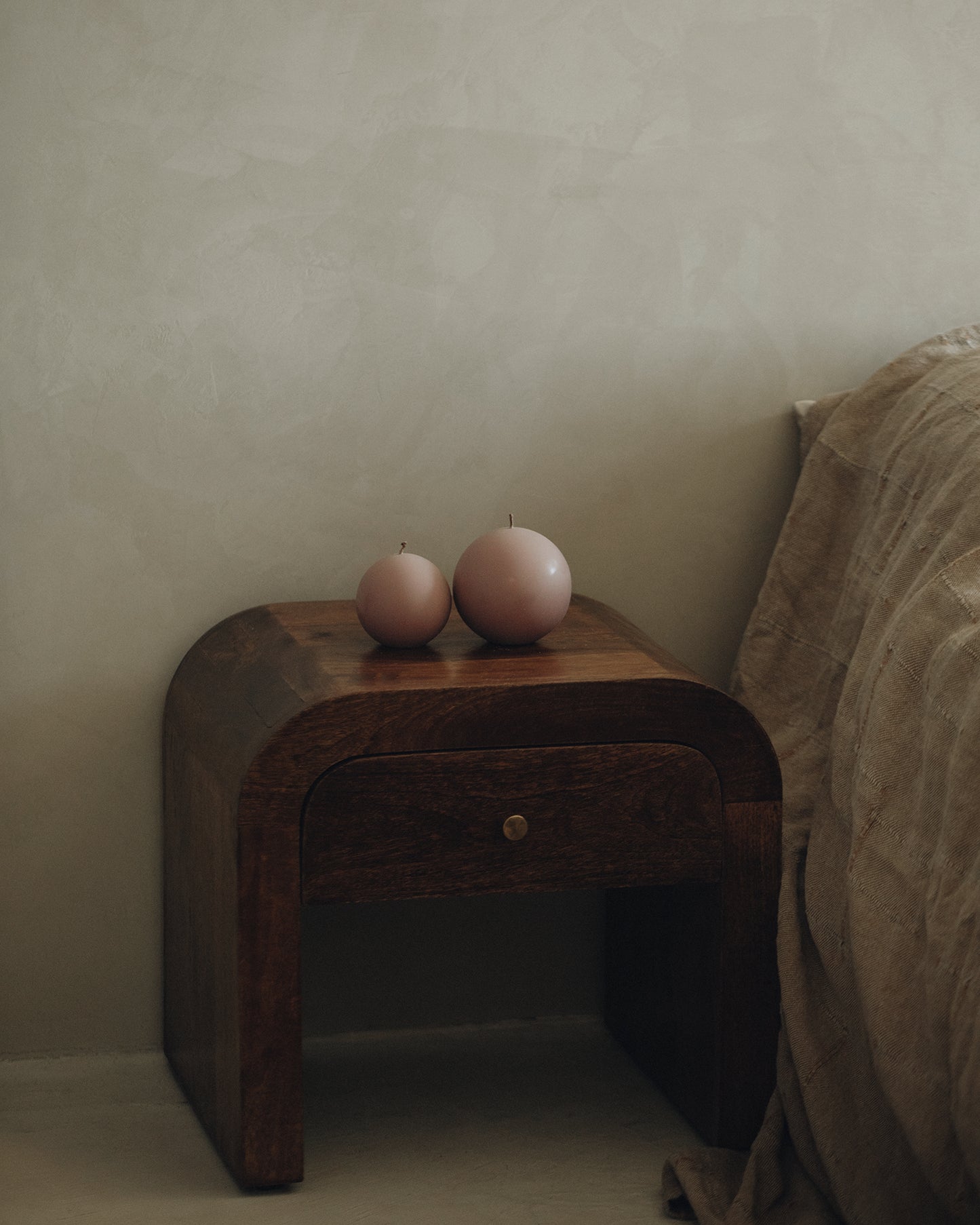LAWA Candles Sphere Candle, set of 2, in Dusty Rose soy wax styled in a home decor setting