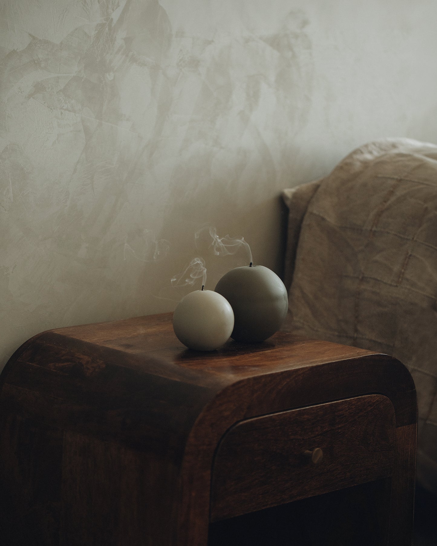 LAWA Candles Sphere Candle, set of 2, in Earthy Green and Jade soy wax styled in a home decor setting