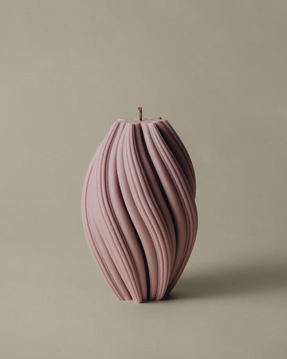 LAWA Candles Swirl Candle, large, in Dusty Rose soy wax featuring spiraling twisted ridges, product photo on a plain background